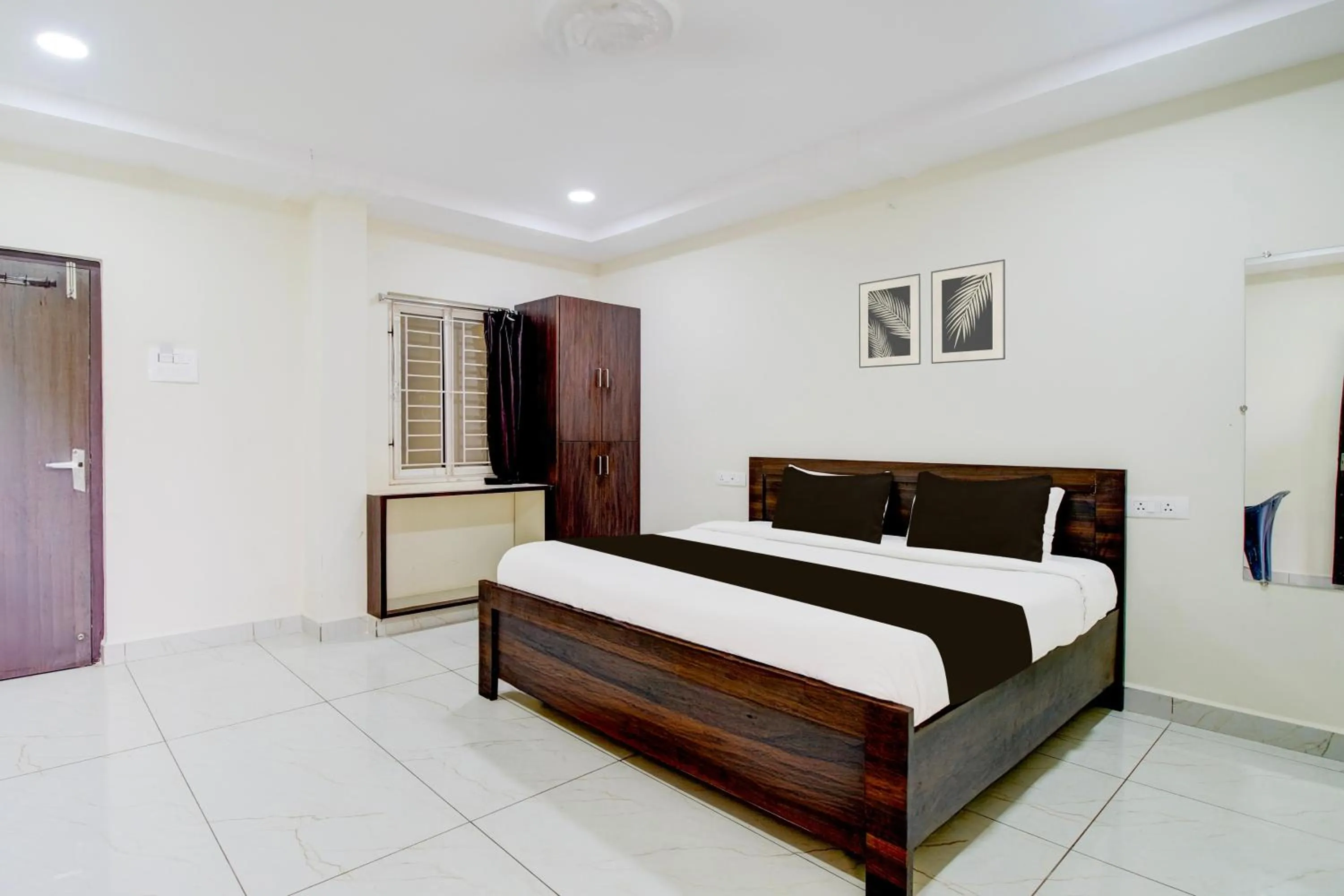 Bedroom, Bed in Super Hotel O Ramavarapadu Near PVR Icon