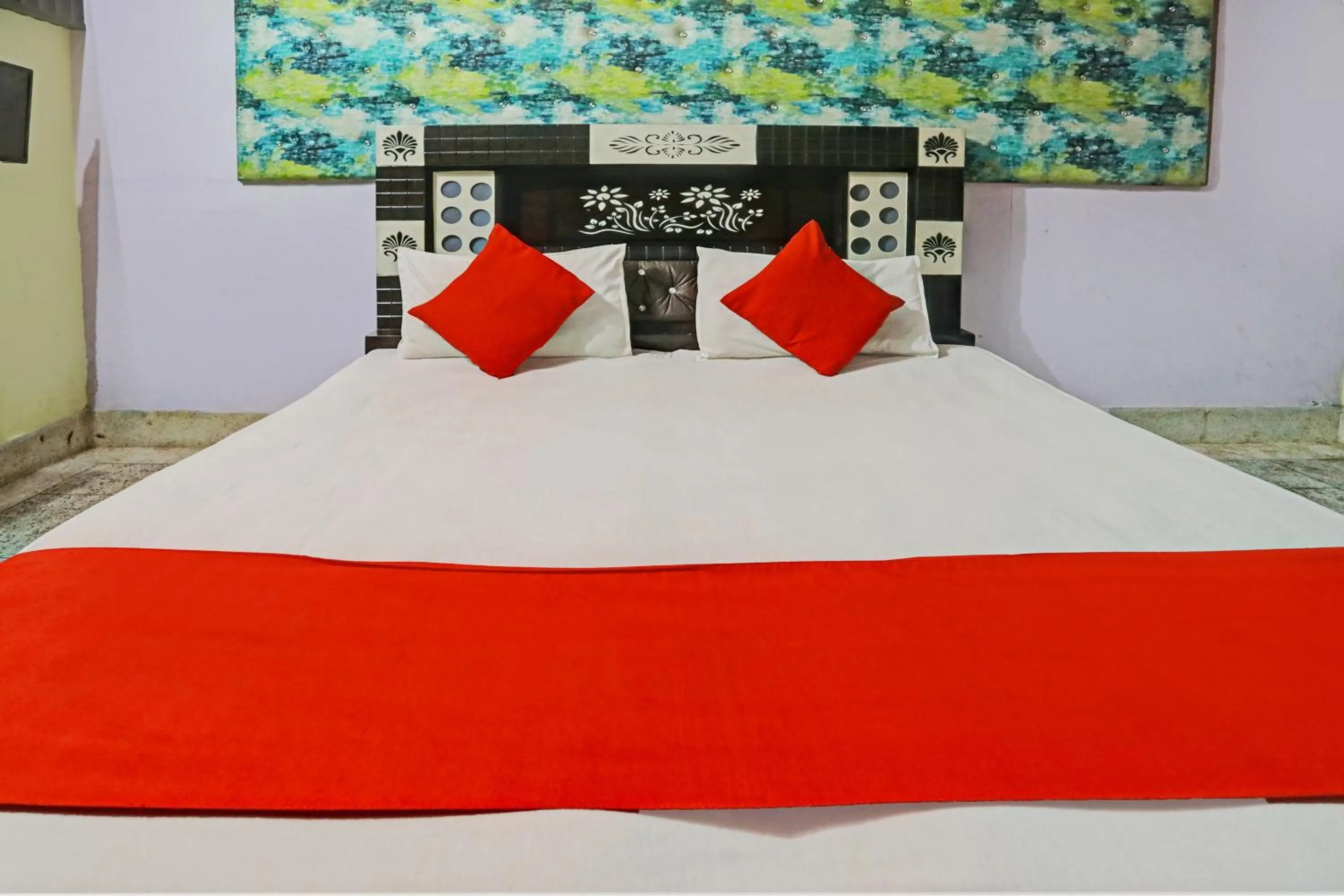 Bedroom in OYO Flagship Hotel Waves