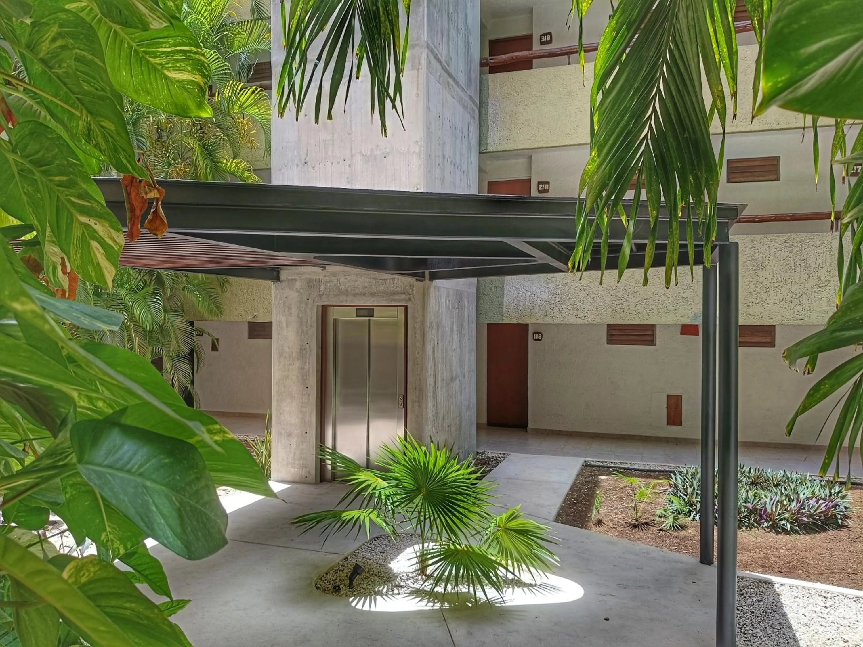 Property building in Casa del Mar Cozumel Hotel & Dive Resort with free access to an exclusive beach club