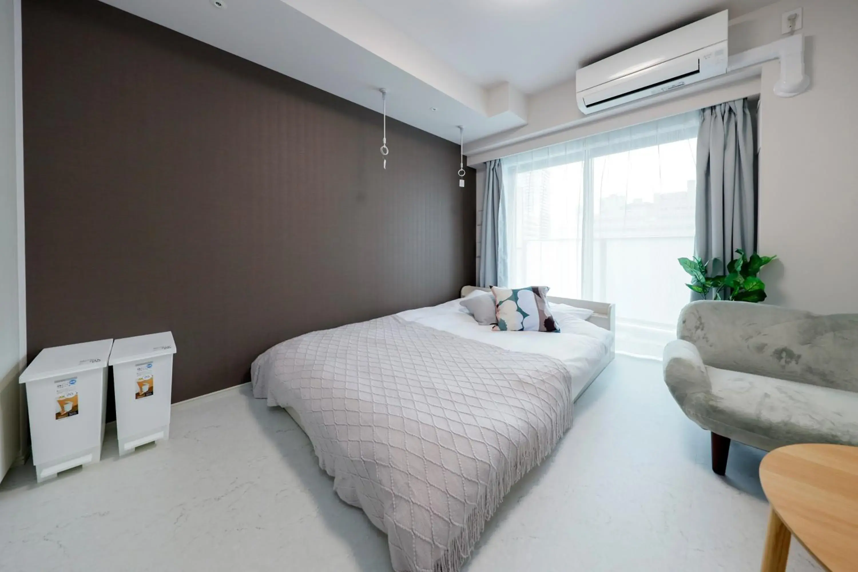 Bed in Seaside Tamachi by Tranova Bed in Seaside Tamachi by Tranova