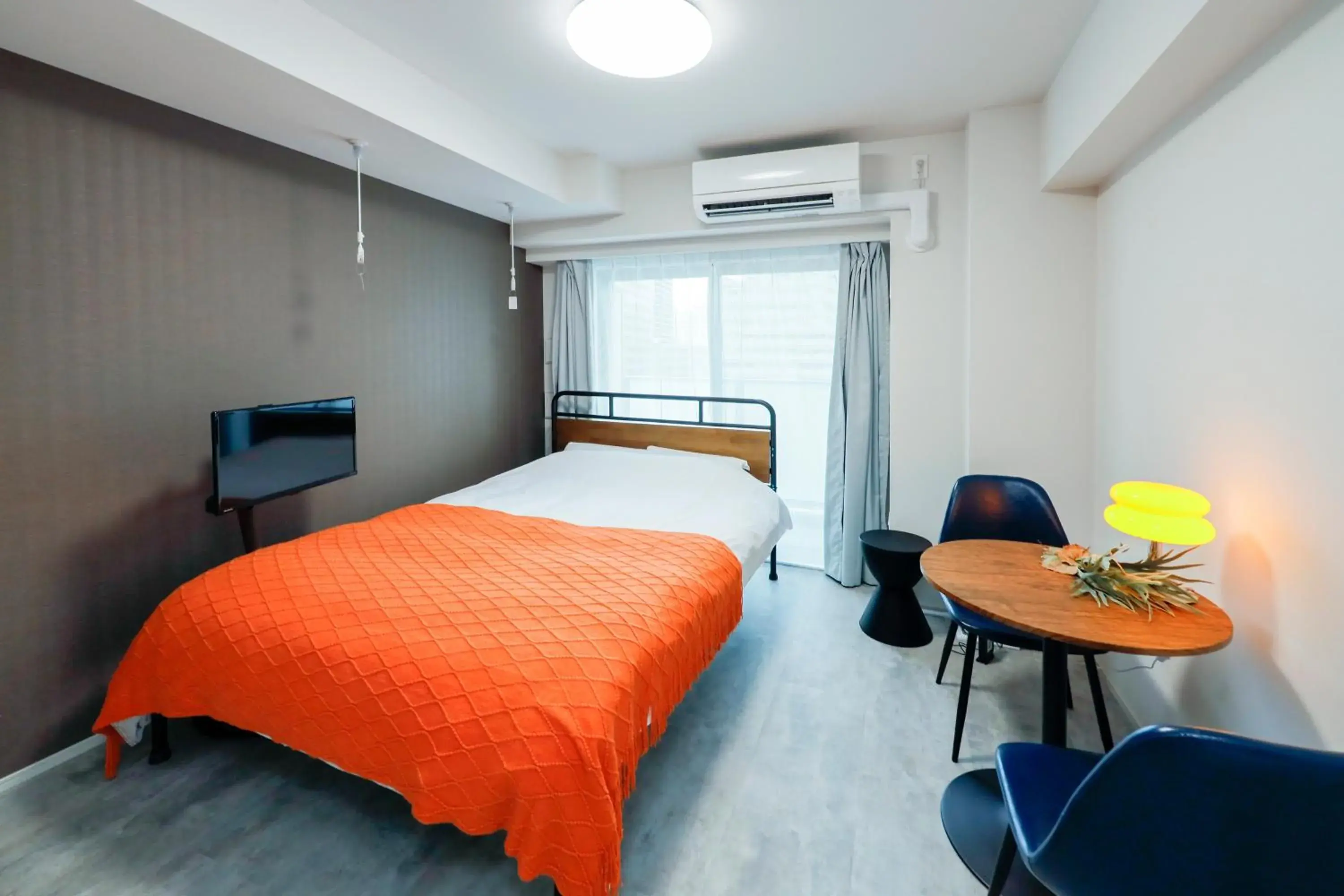 Bed in Seaside Tamachi by Tranova Bed in Seaside Tamachi by Tranova