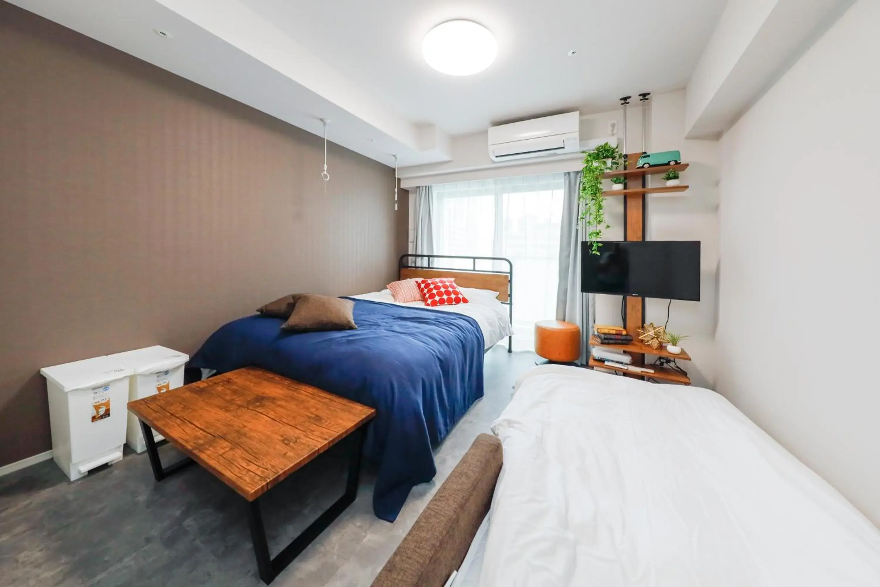 Bed in Seaside Tamachi by Tranova Bed in Seaside Tamachi by Tranova