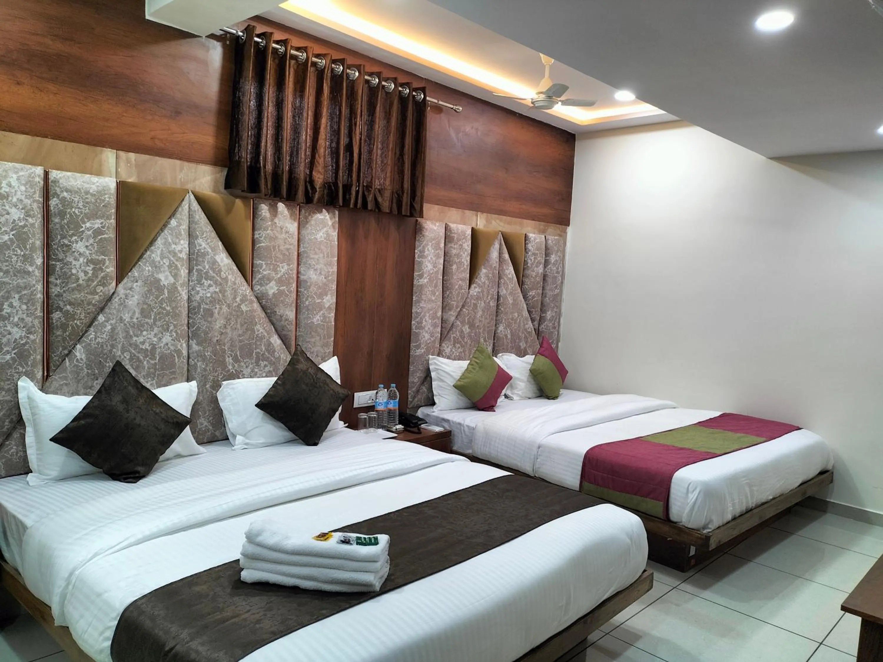 Bed in Hotel Divya Palace