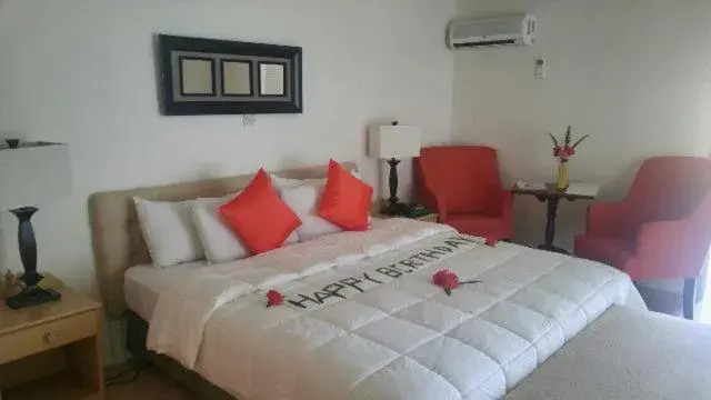 Bed in Sunset Shores Beach Hotel Bed in Sunset Shores Beach Hotel