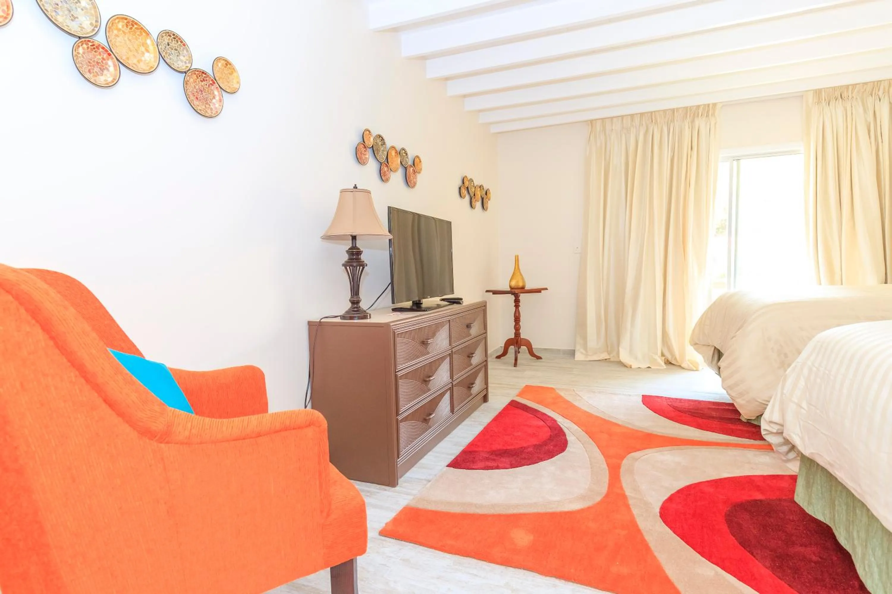 TV and multimedia, Bed in Sunset Shores Beach Hotel