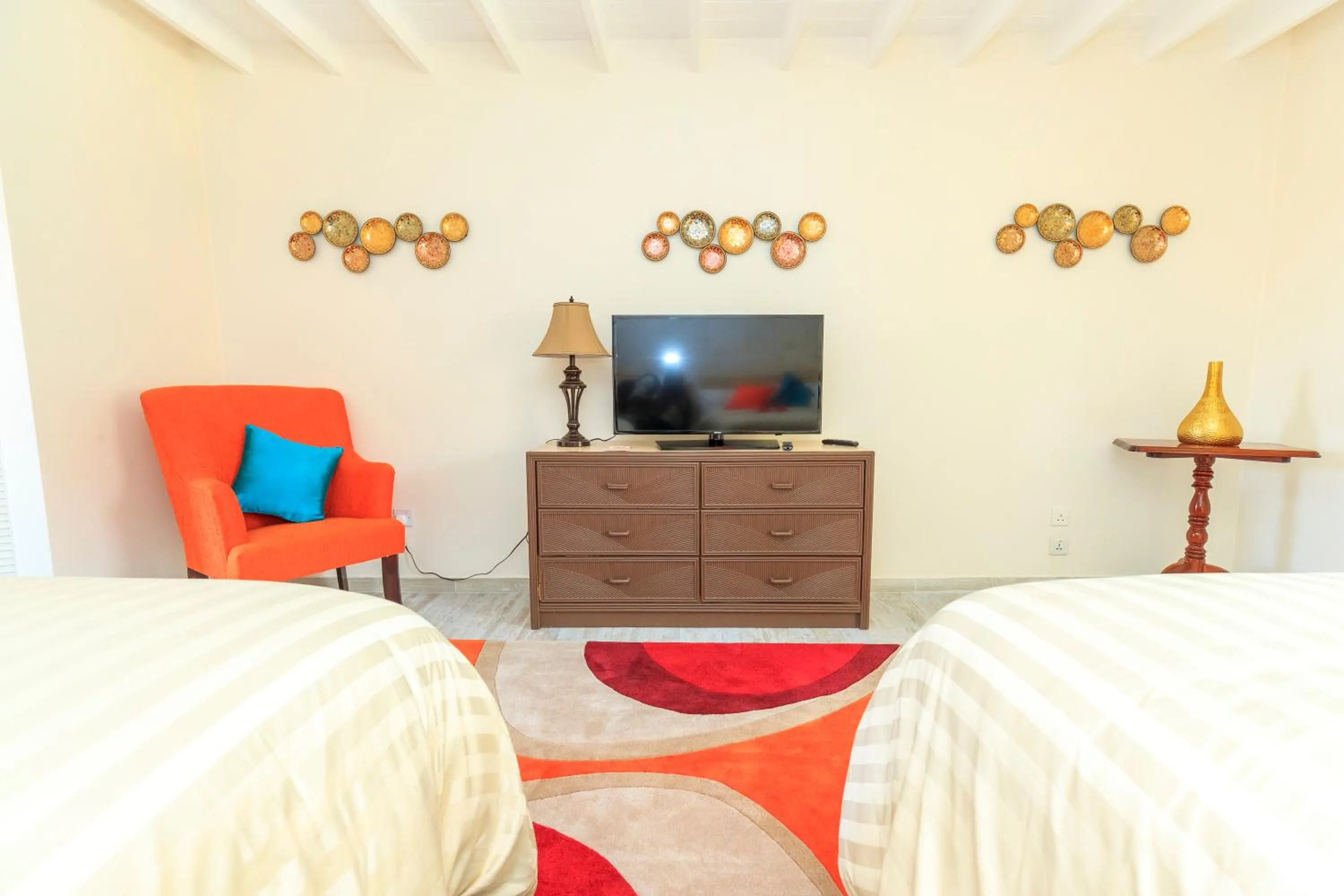 Bed in Sunset Shores Beach Hotel