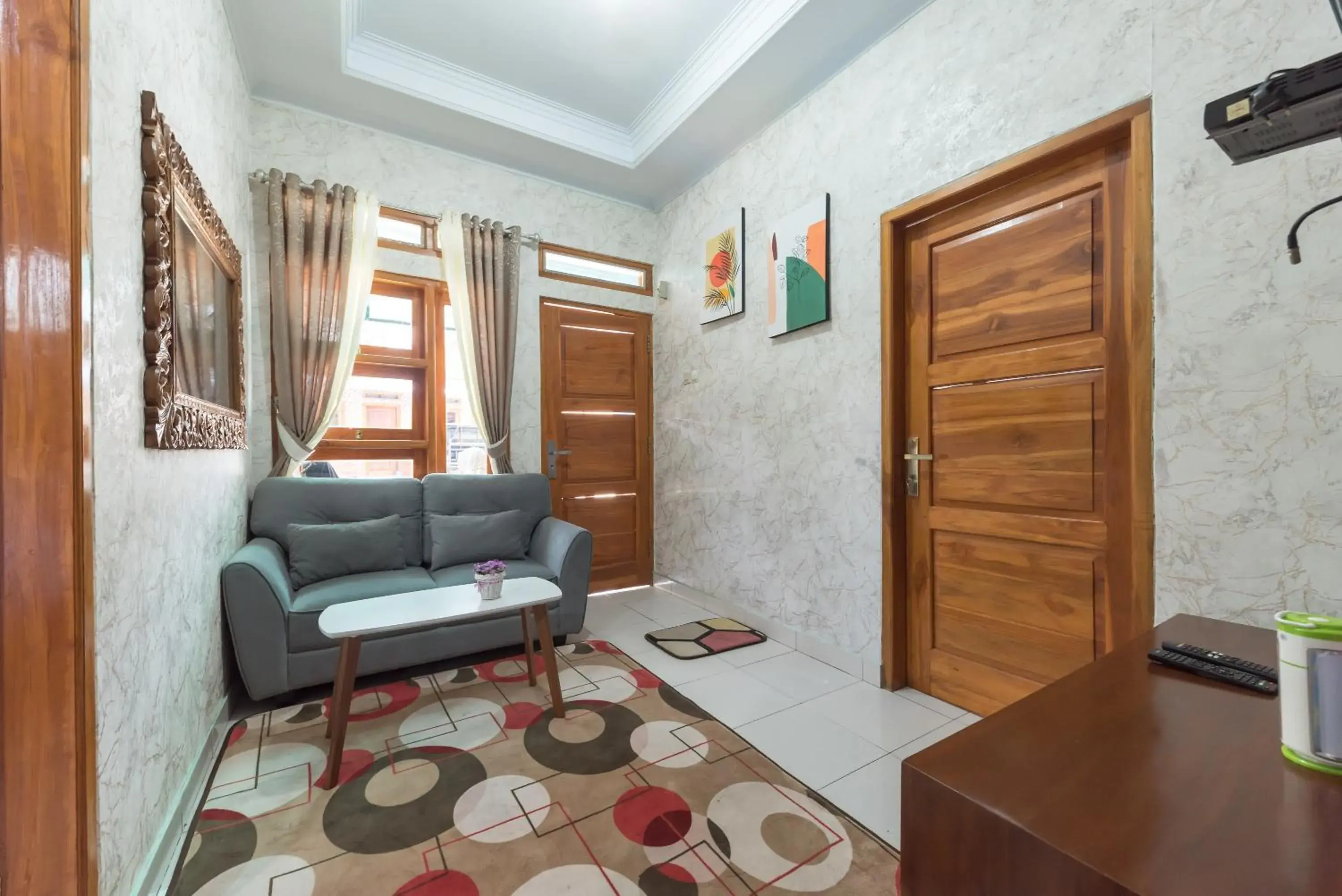 Living room in RedDoorz Resort @ Ciater 2 Living room in RedDoorz Resort @ Ciater 2