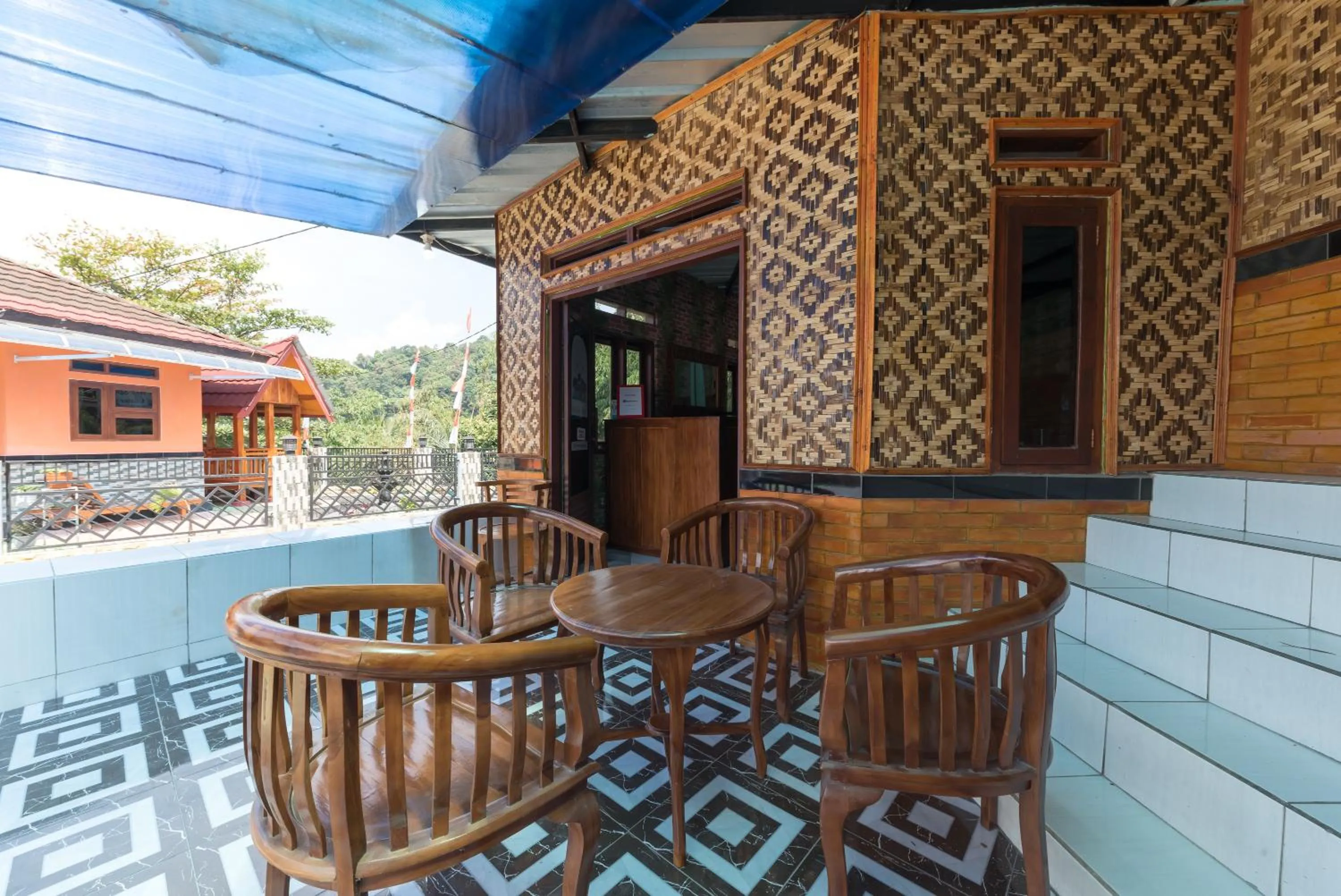 Seating area in RedDoorz Resort @ Ciater 2