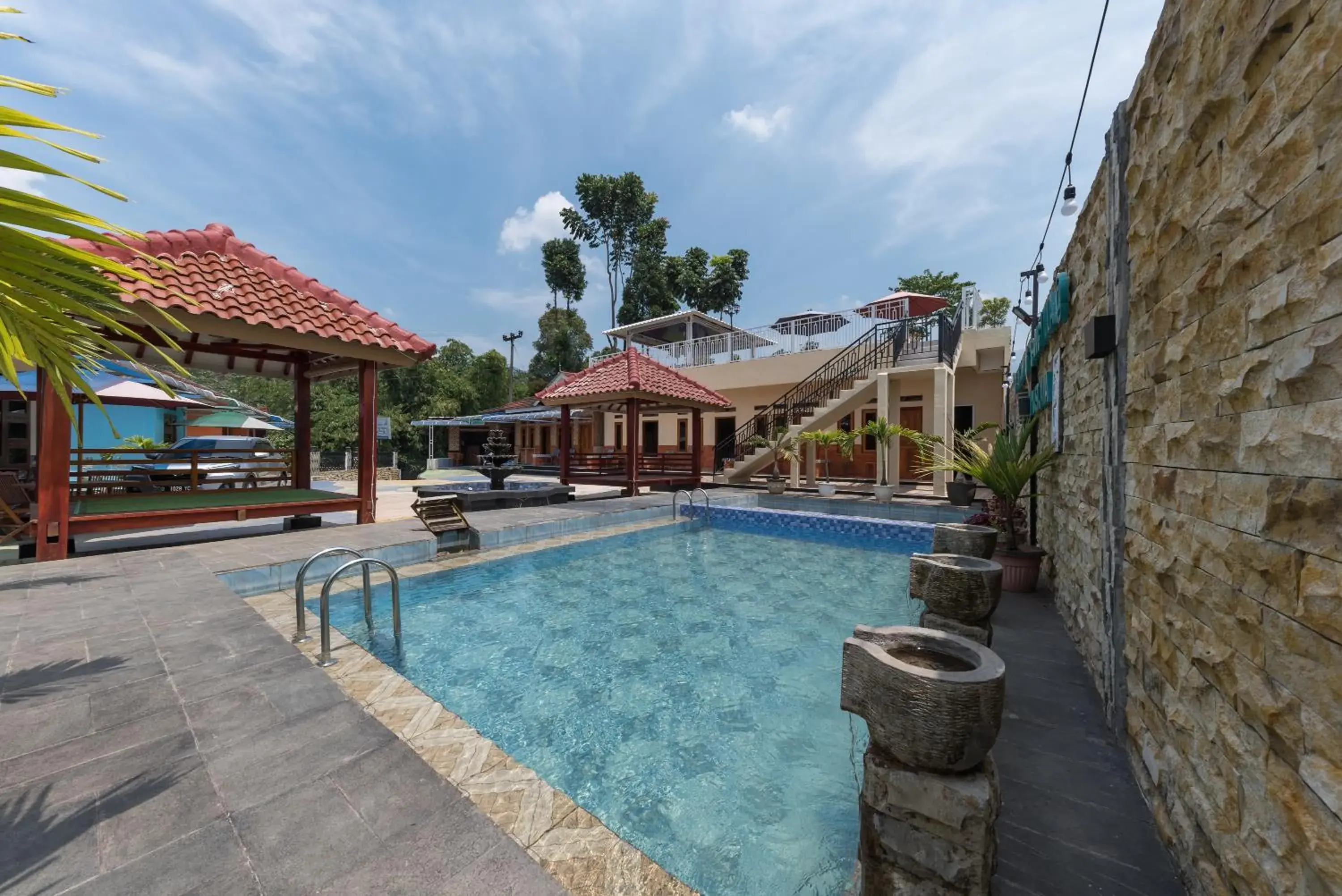 Swimming pool in RedDoorz Resort @ Ciater 2 Swimming pool in RedDoorz Resort @ Ciater 2