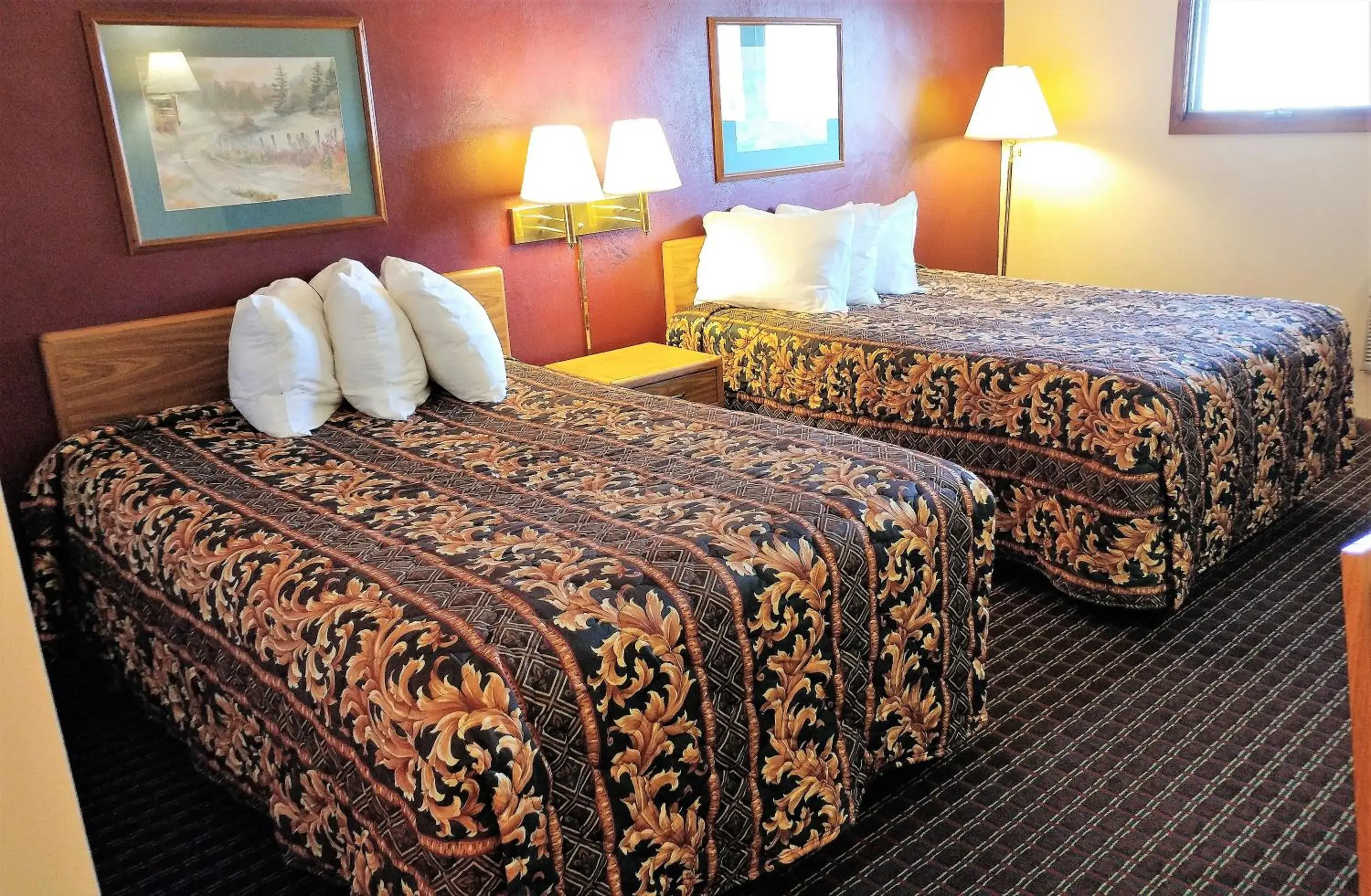 Bed in Red Carpet Inn - Windom Bed in Red Carpet Inn - Windom
