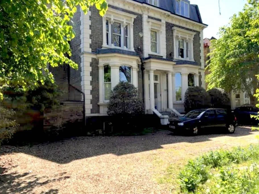 Elegant 2-Bedroom Getaway w Terrace & Garden Views