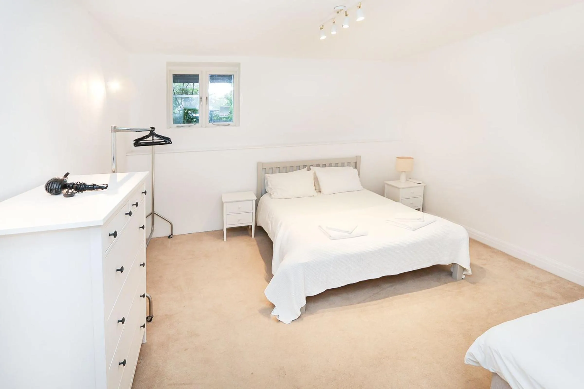 Bed in Elegant 2-Bedroom Getaway w Terrace & Garden Views