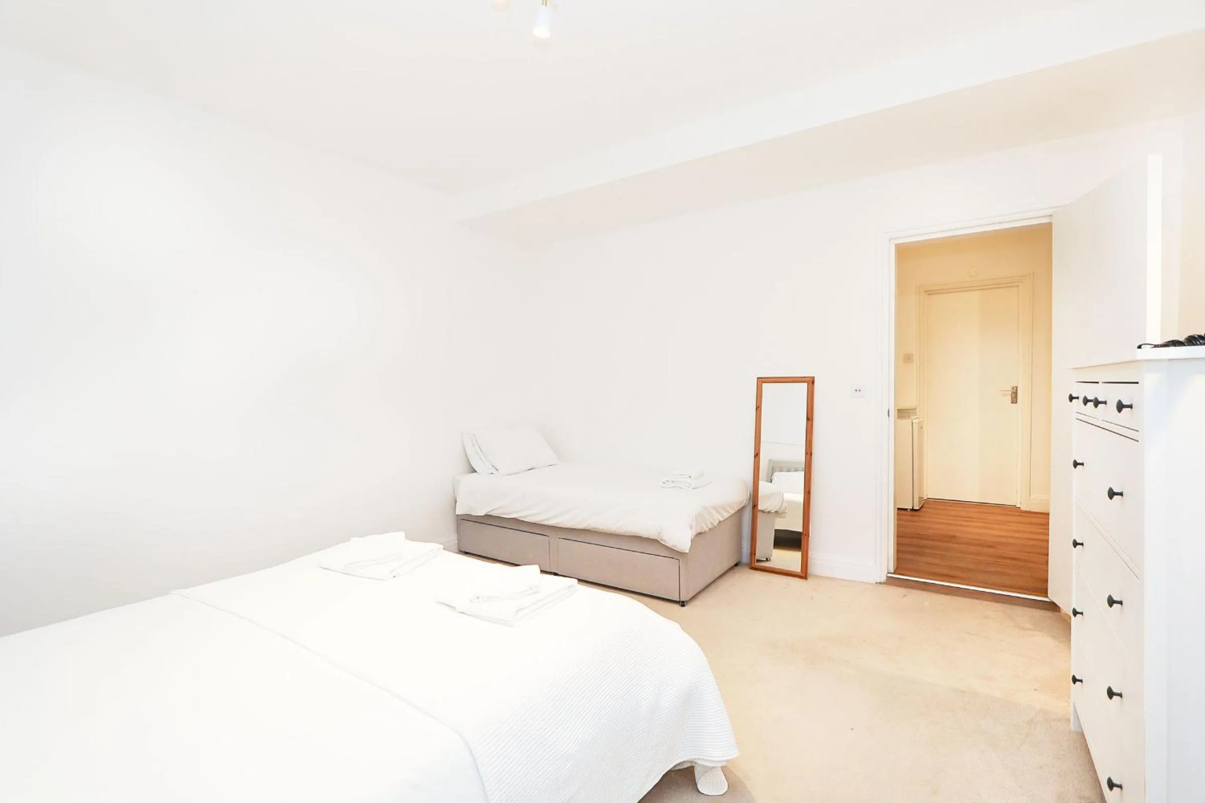 Bed in Elegant 2-Bedroom Getaway w Terrace & Garden Views
