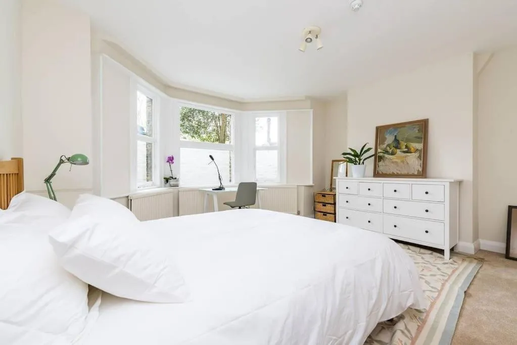 Elegant 2-Bedroom Getaway w Terrace & Garden Views