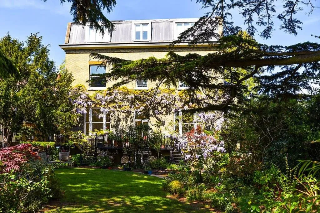 Elegant 2-Bedroom Getaway w Terrace & Garden Views