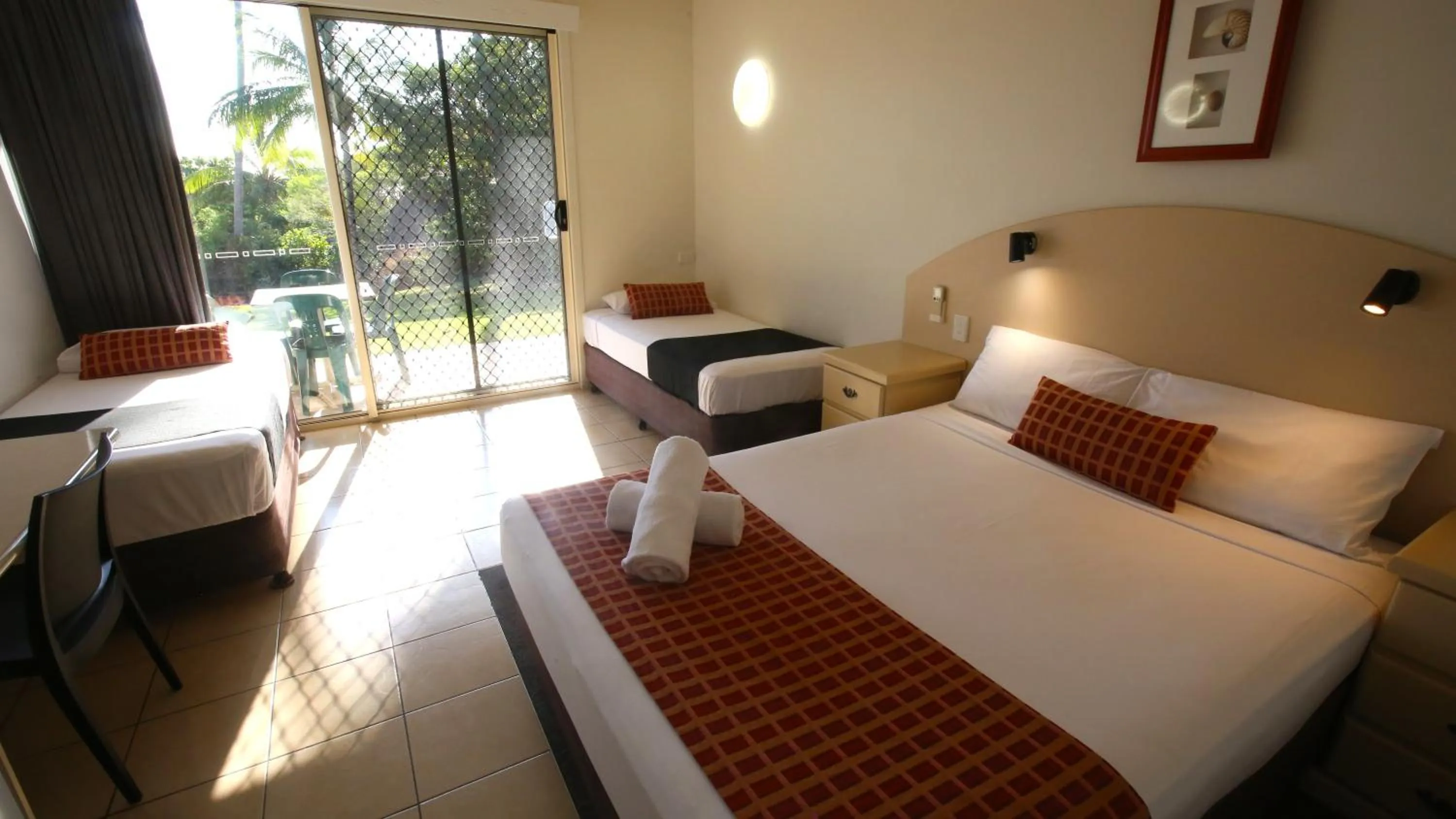 Bed in Whitsunday Sands Resort