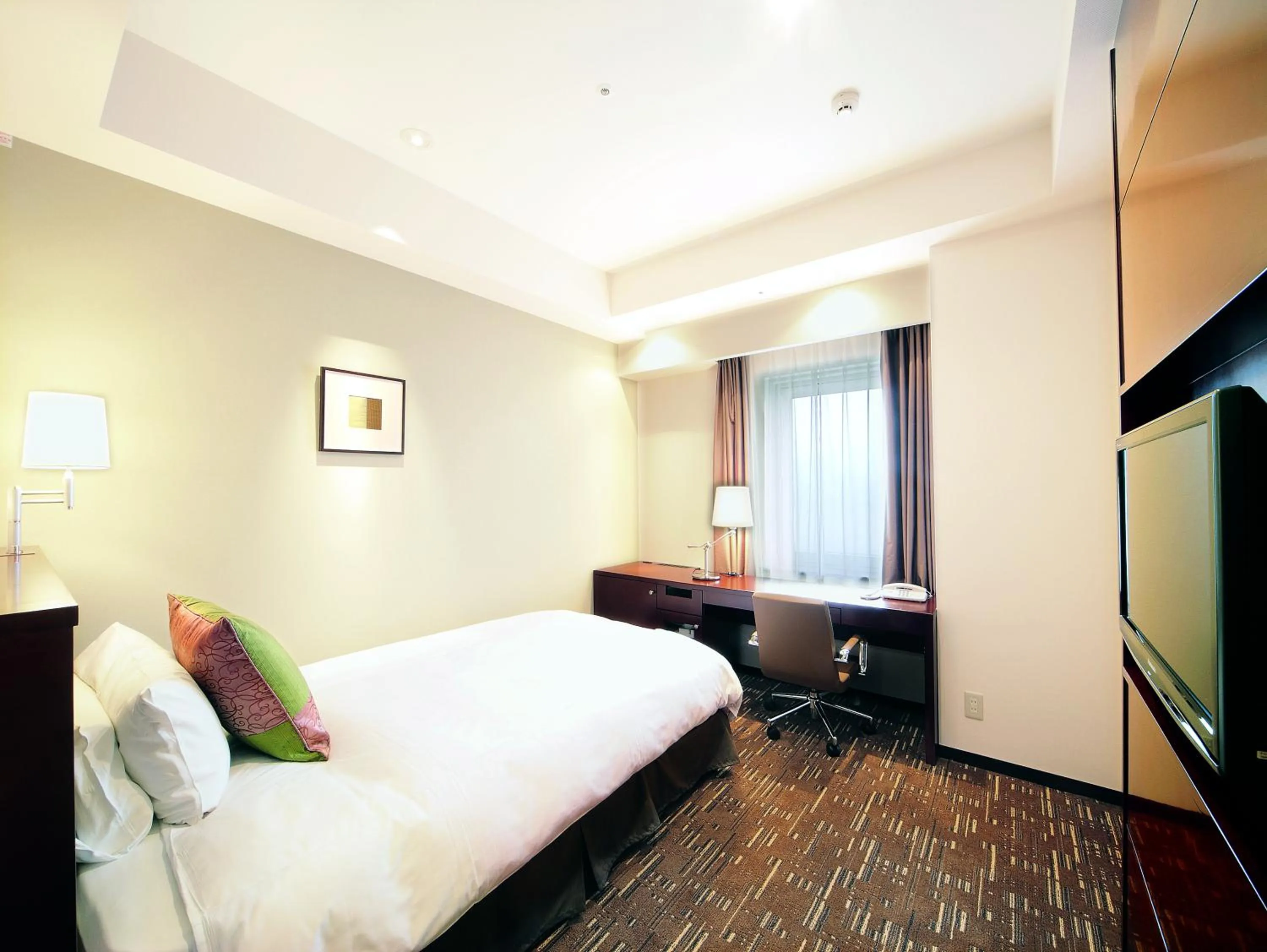 Bed in Akita Castle Hotel