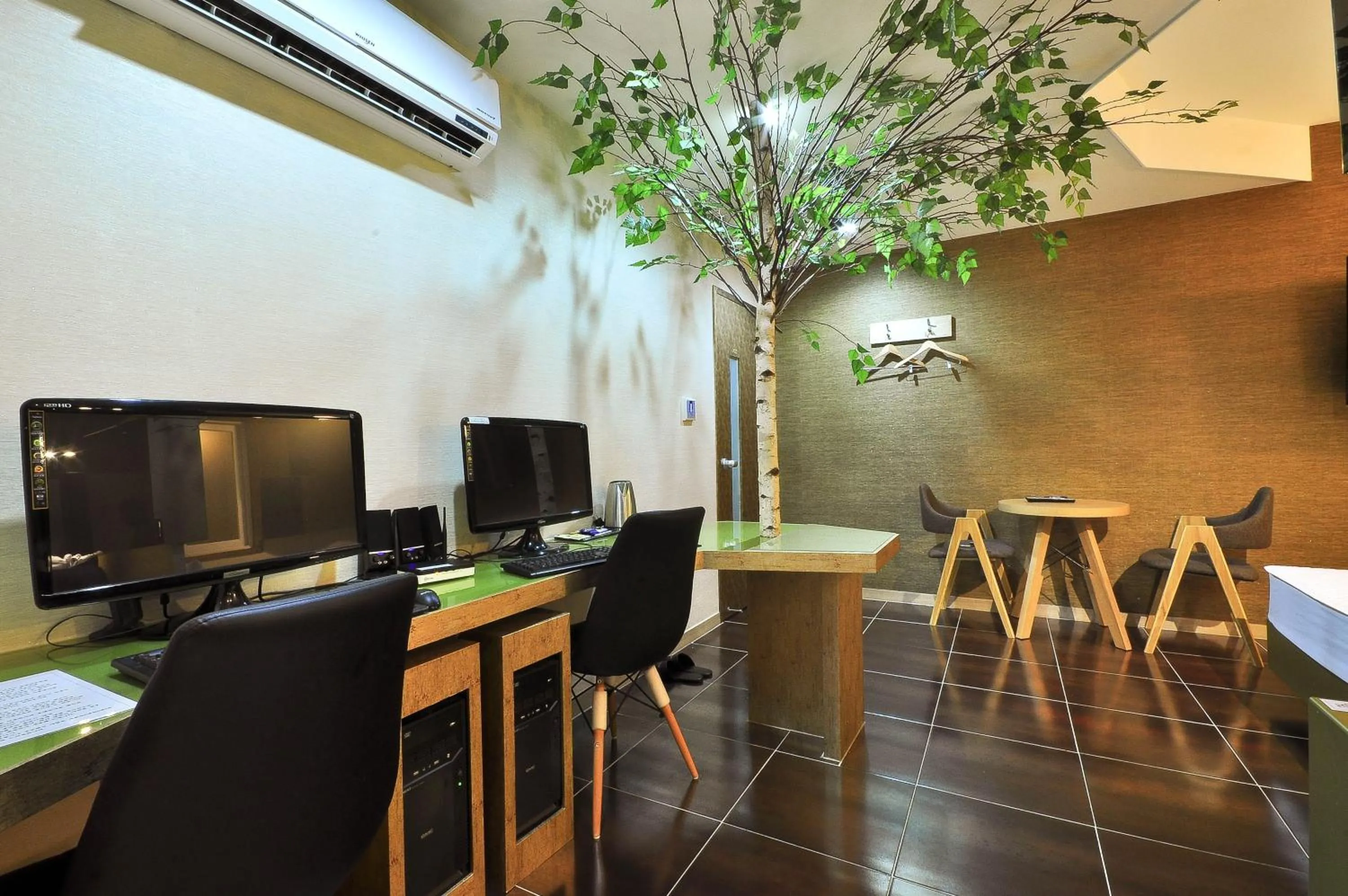 Communal lounge/ TV room in Boutique Hotel Aria Nampo