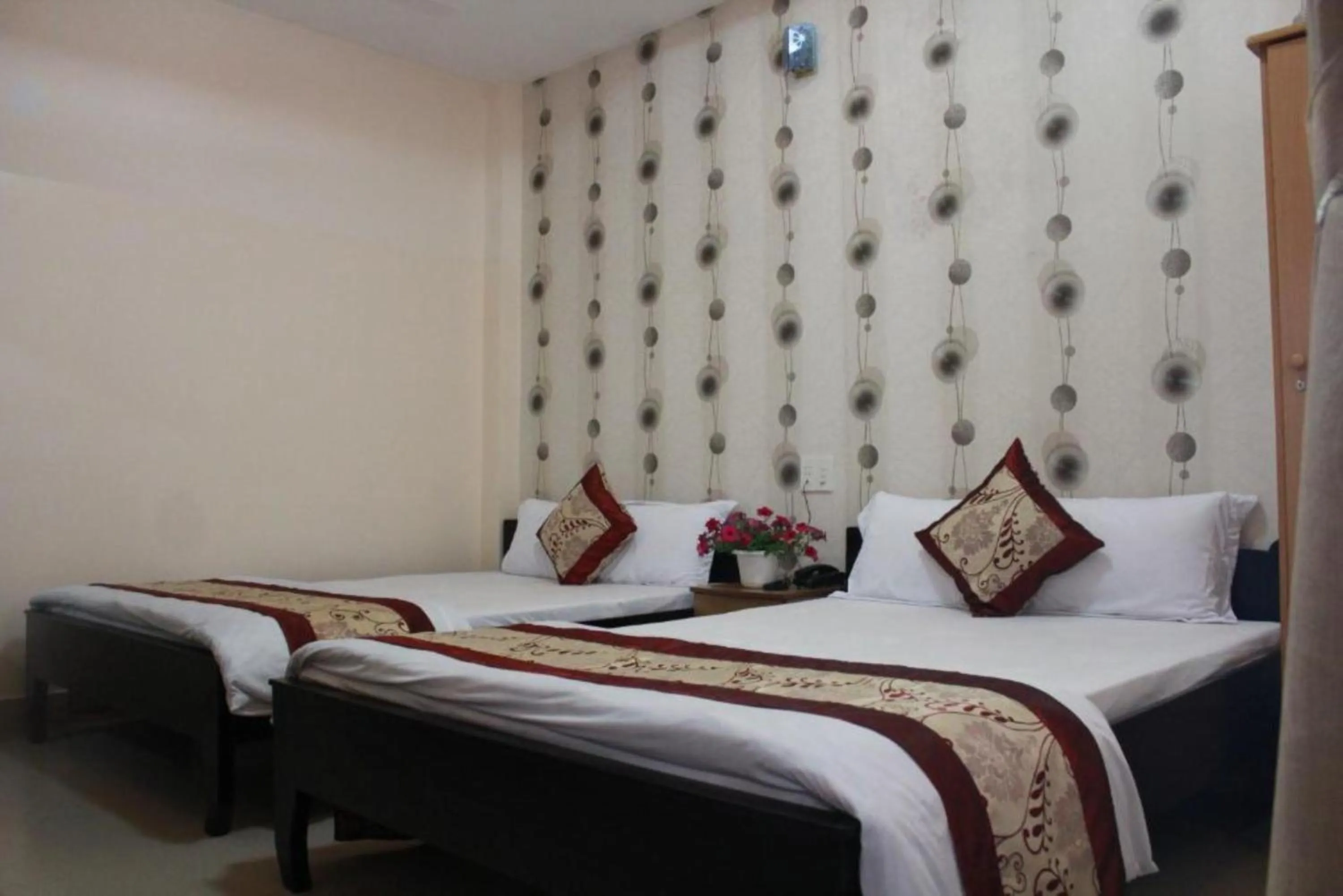 Bed in Thanh Long Da Lat Hotel