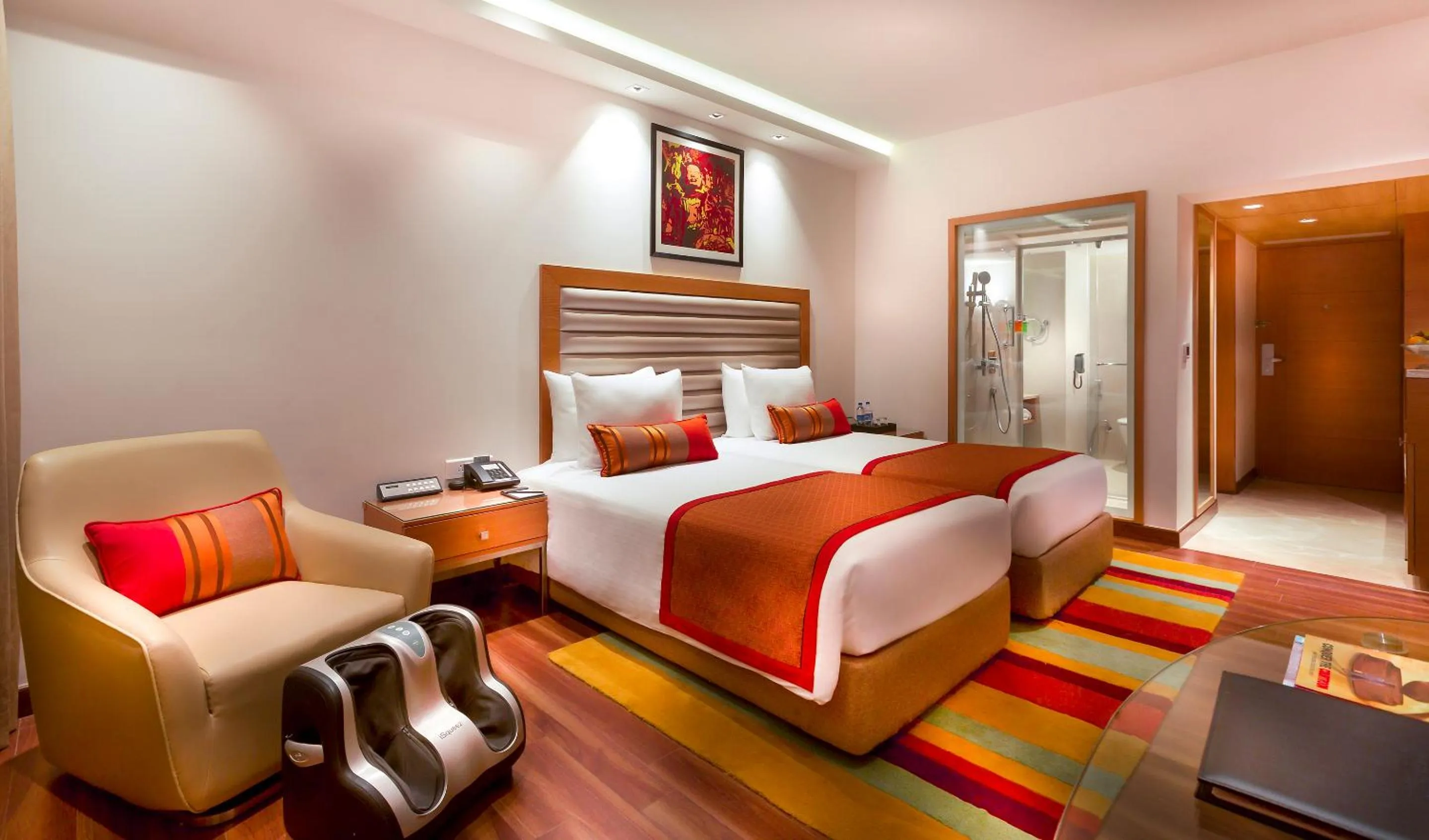 Bed in Grand Chennai by GRT Hotels