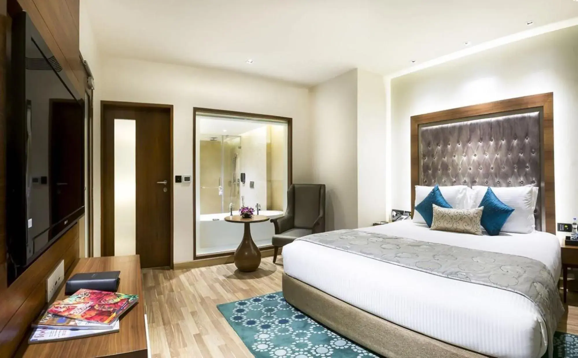 Living room, Bed in Grand Chennai by GRT Hotels Living room, Bed in Grand Chennai by GRT Hotels