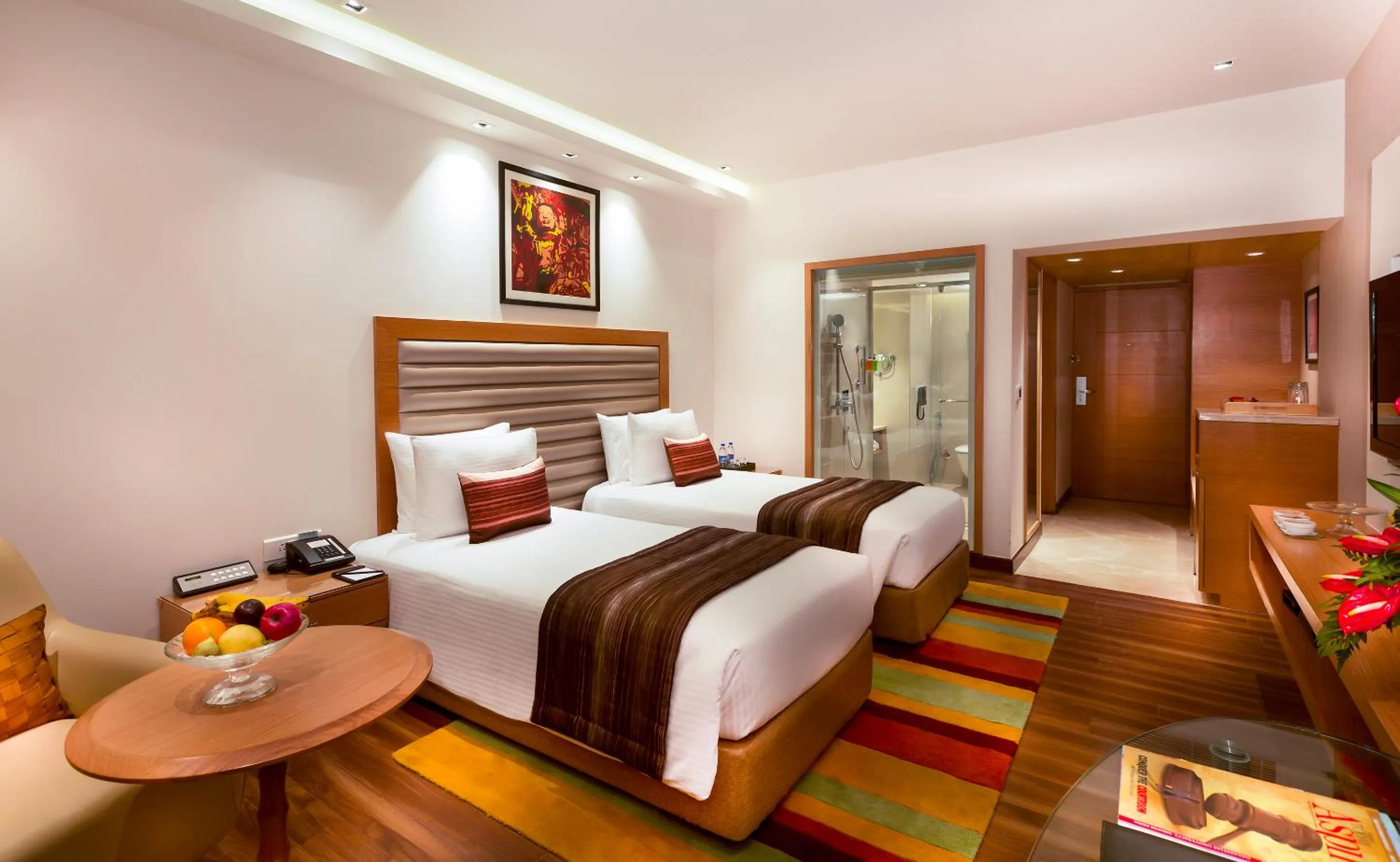 Bed in Grand Chennai by GRT Hotels