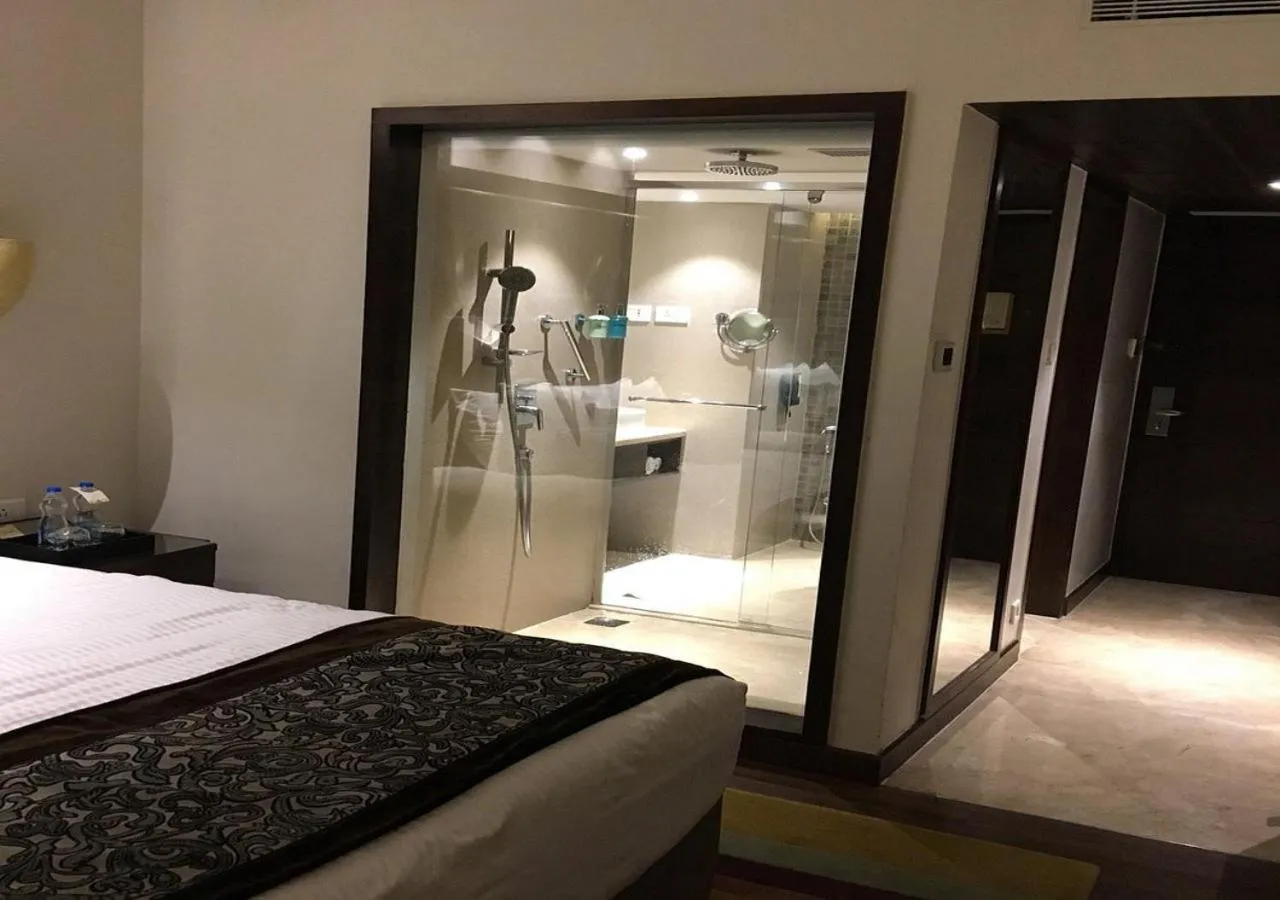Bathroom, Bed in Grand Chennai by GRT Hotels