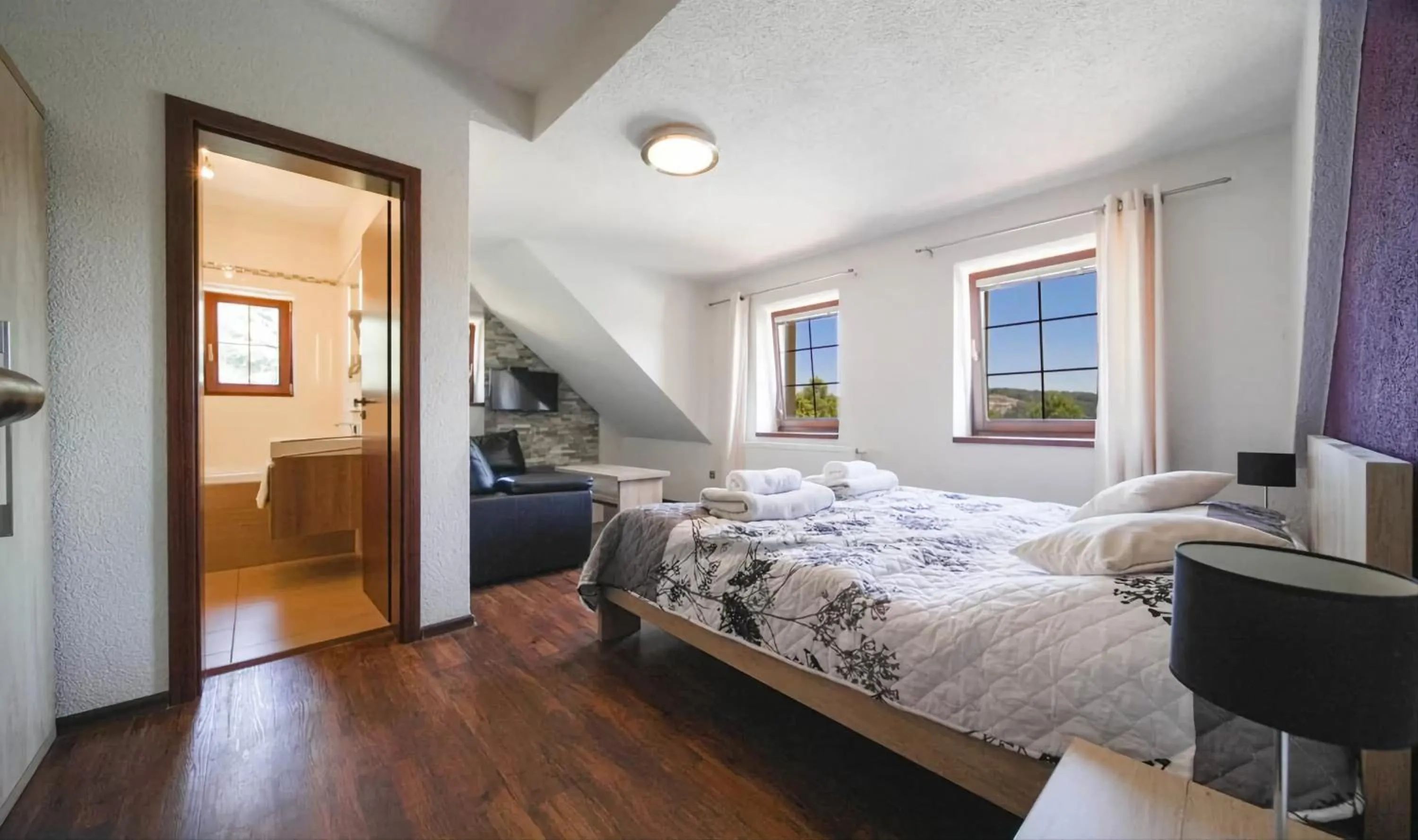 Living room, Bed in Wellness Penzion Life