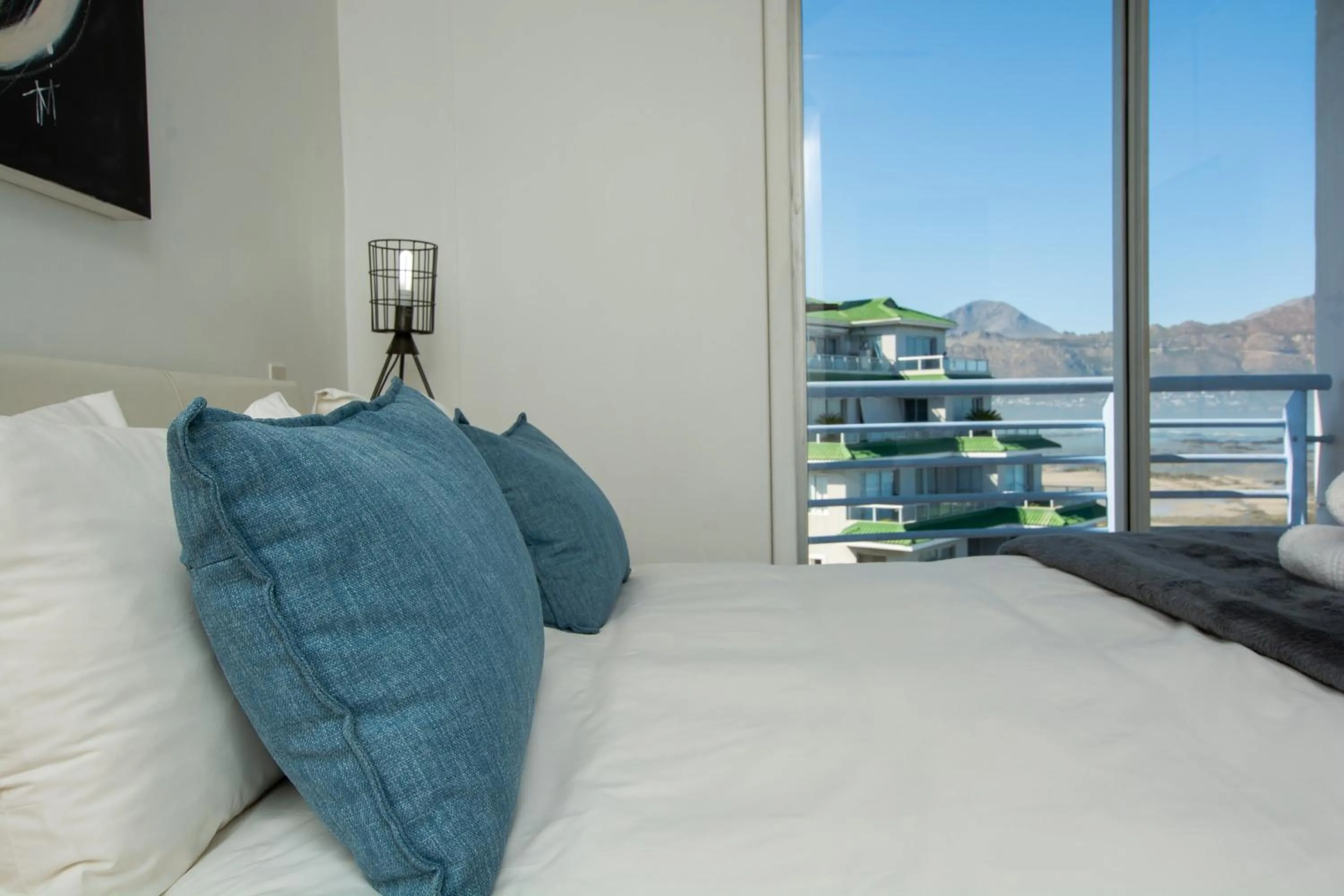 Bed in Ocean Breeze Hotel