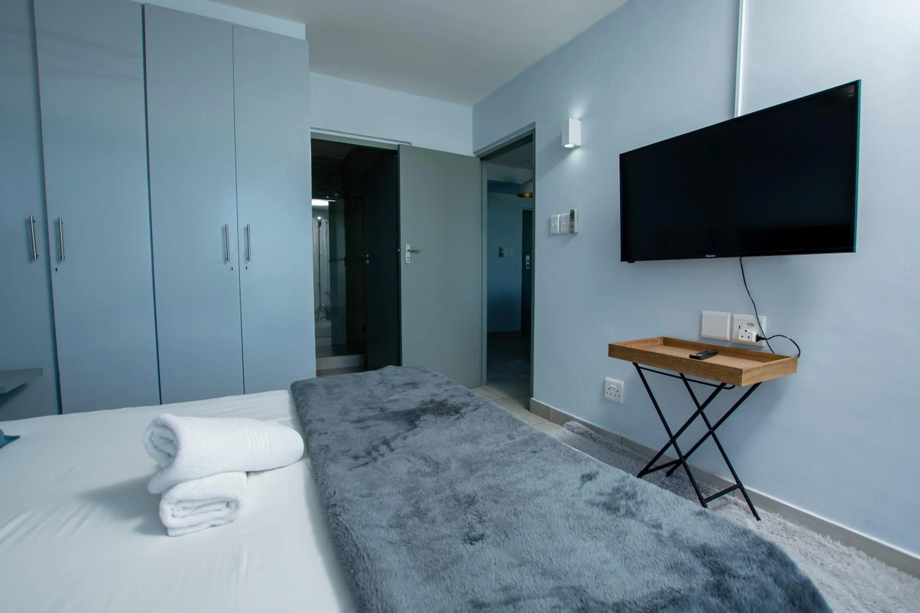 Bed in Ocean Breeze Hotel