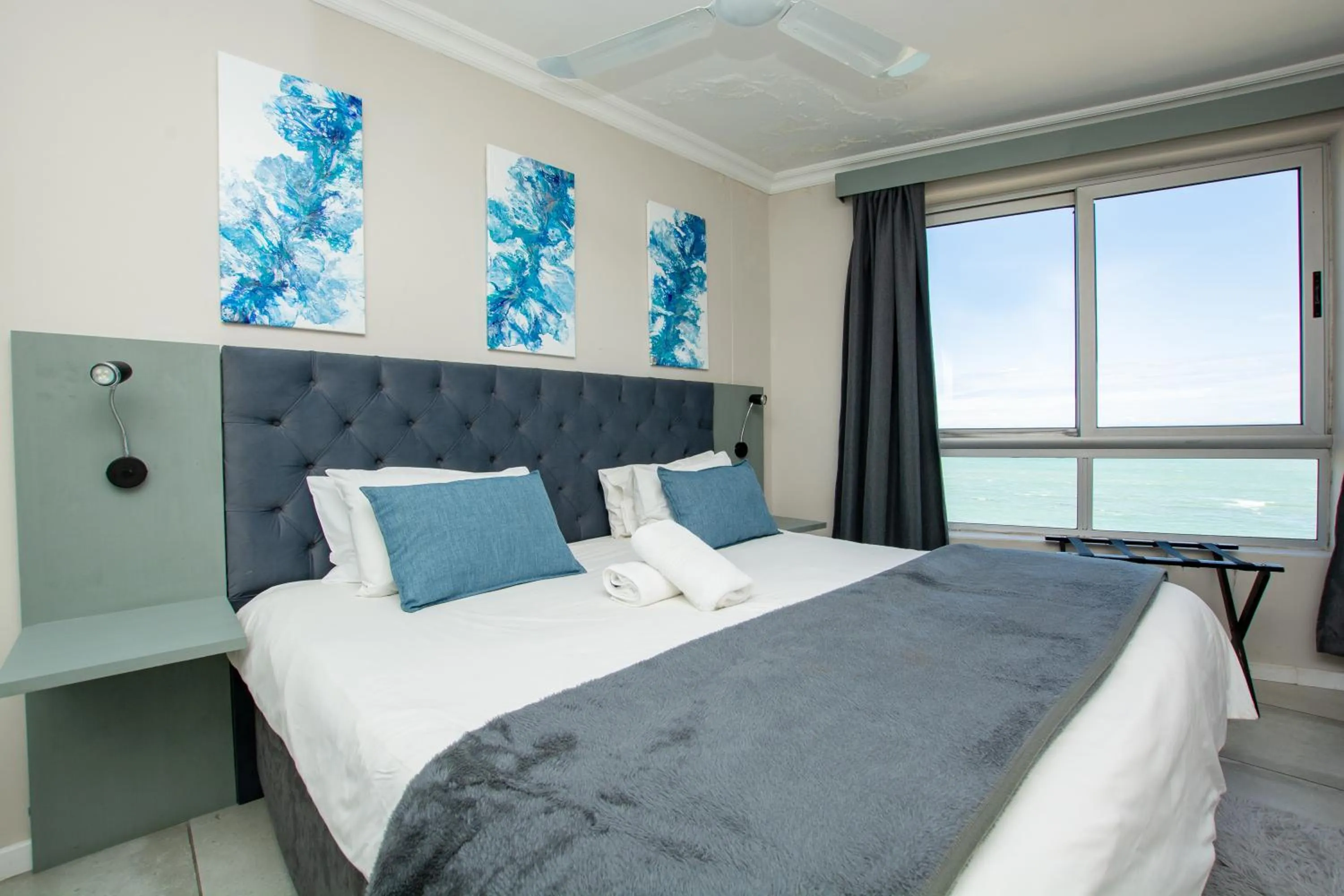 Bed in Ocean Breeze Hotel