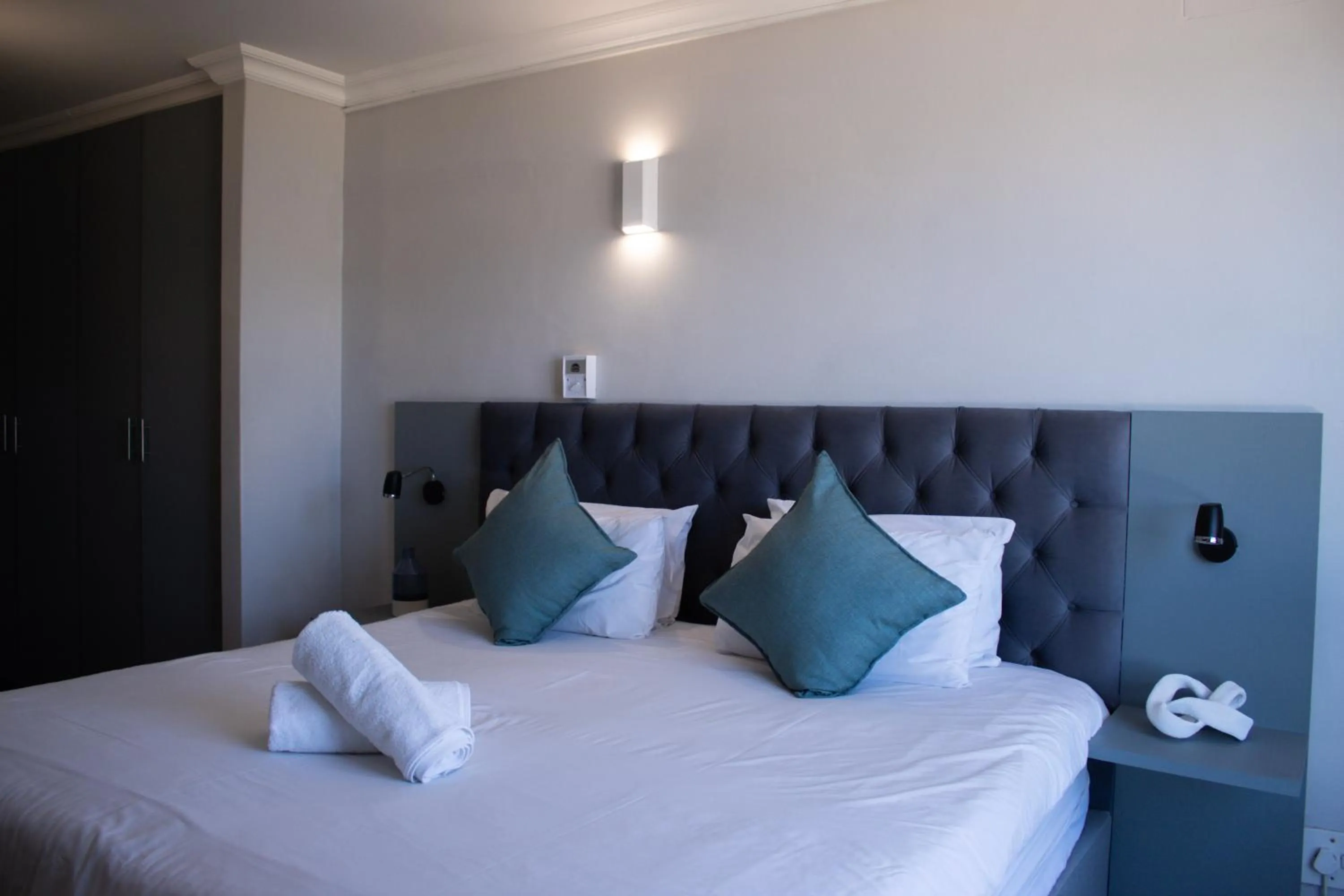 Bed in Ocean Breeze Hotel