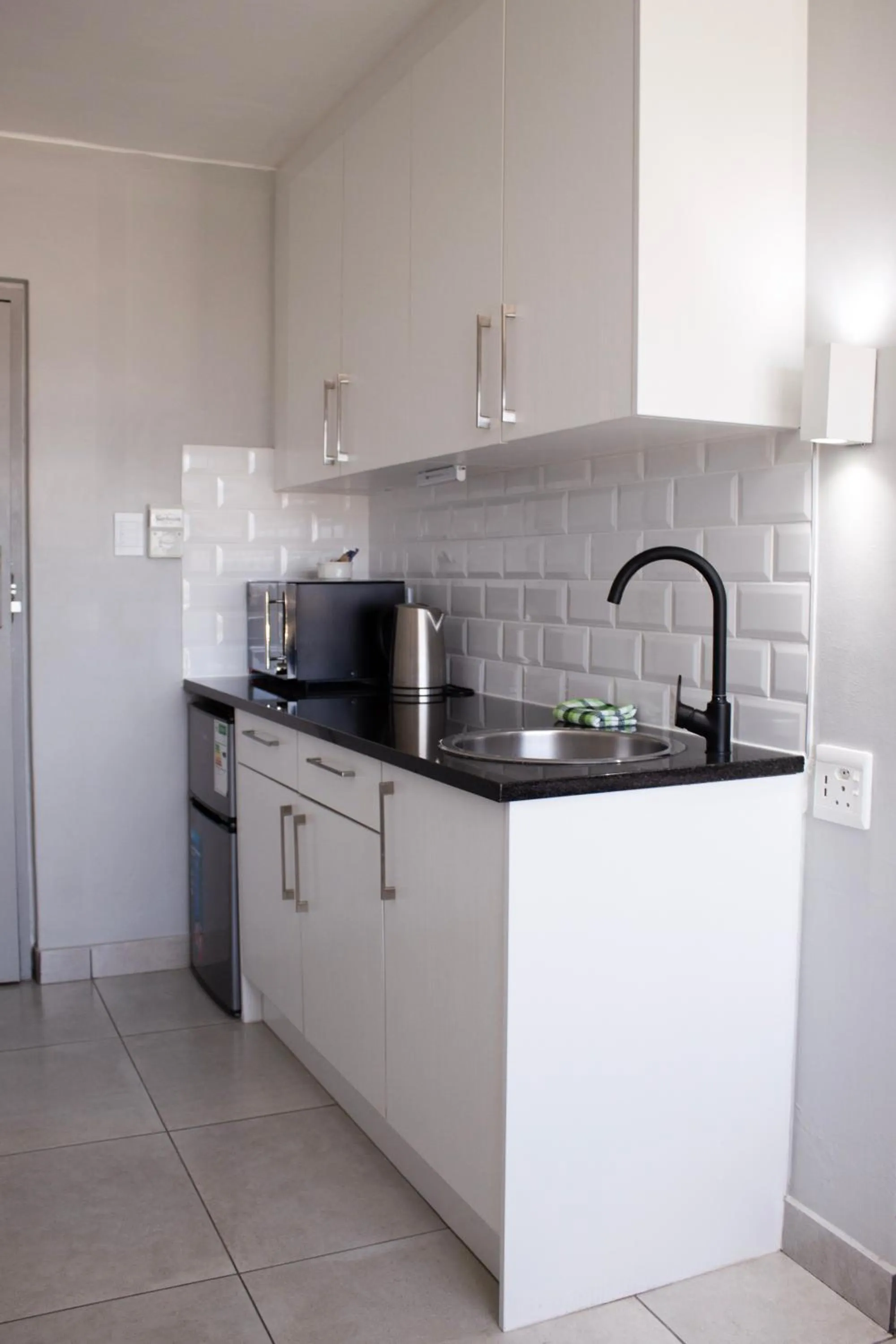 Kitchen or kitchenette in Ocean Breeze Hotel