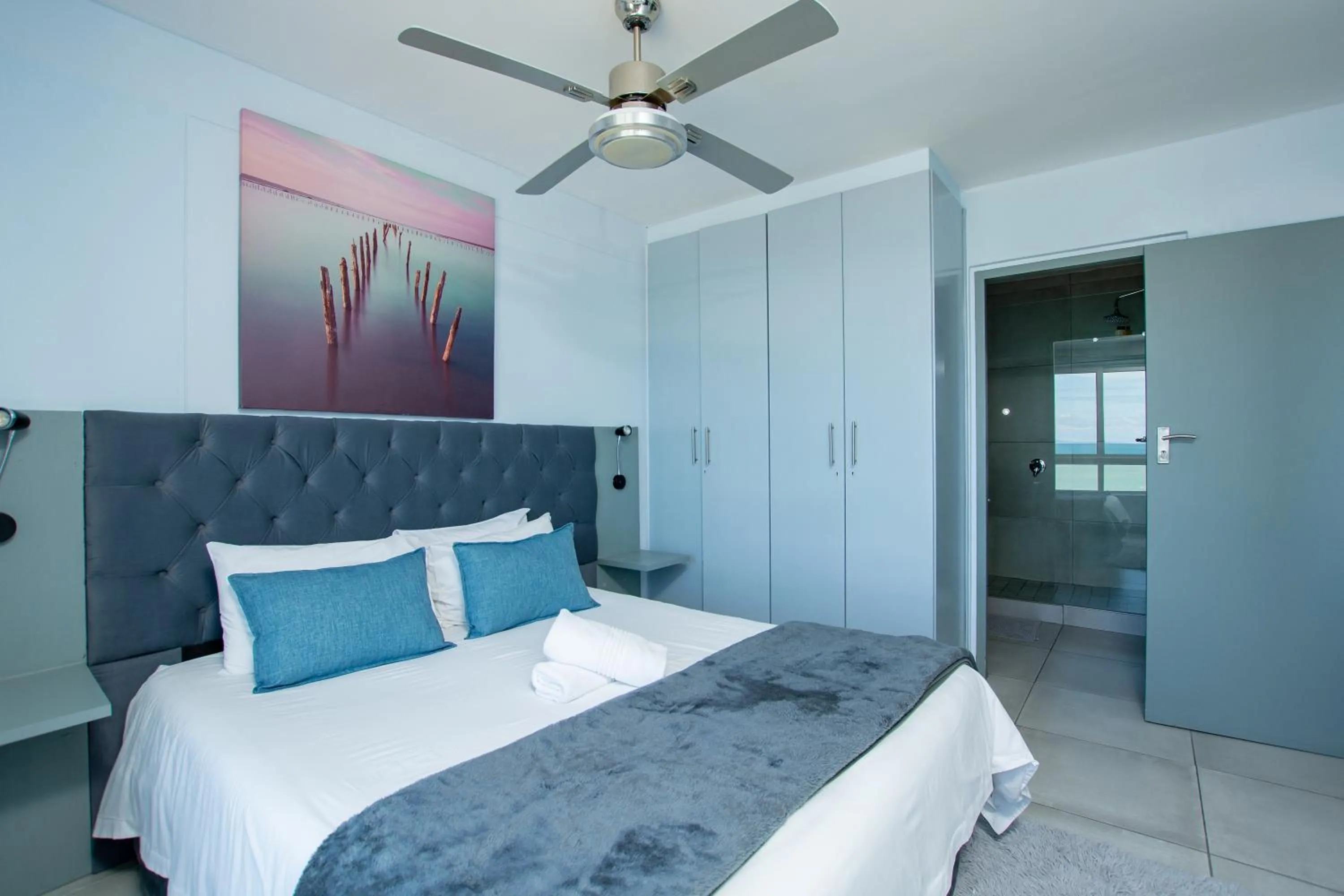 Bed in Ocean Breeze Hotel