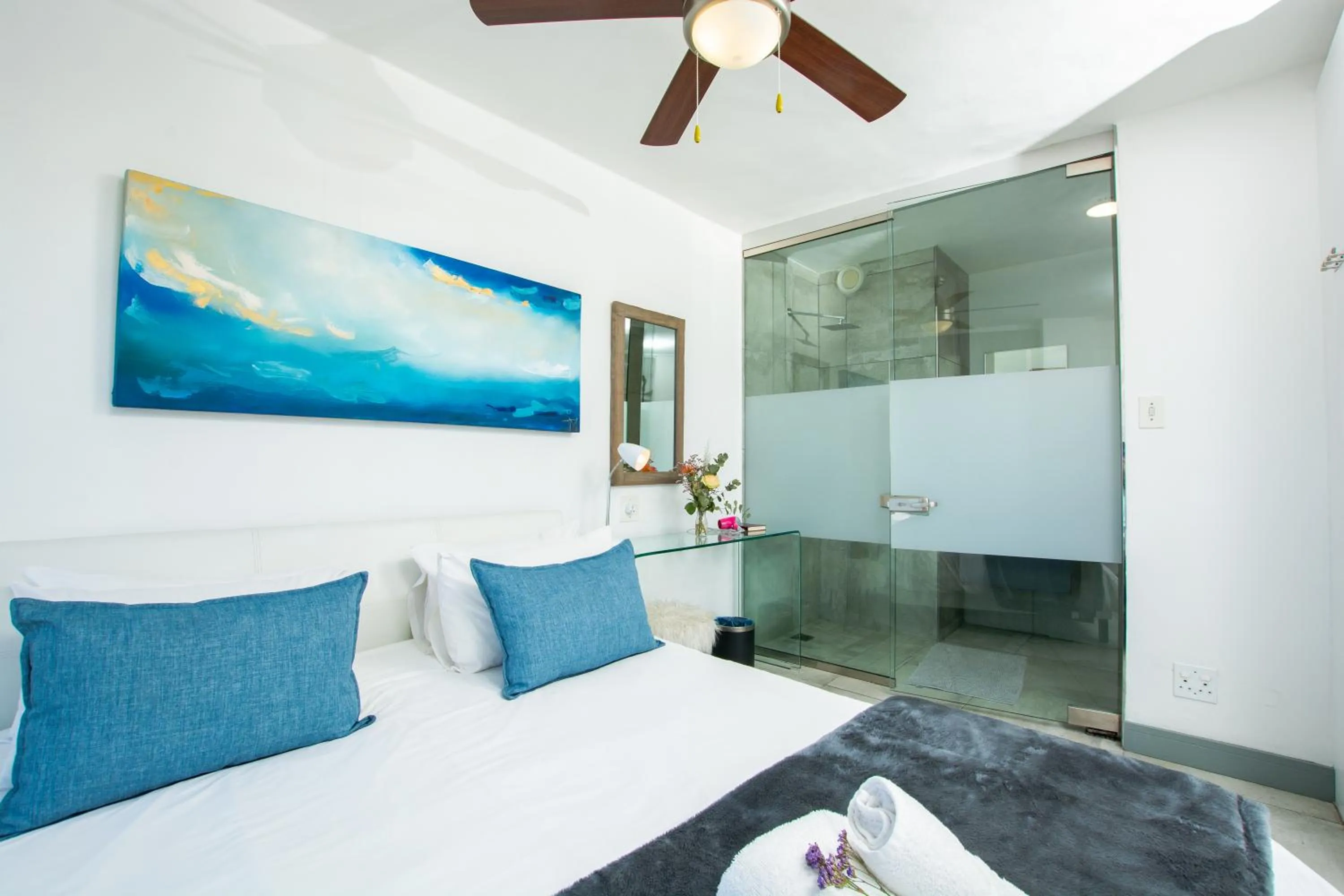 Bed in Ocean Breeze Hotel