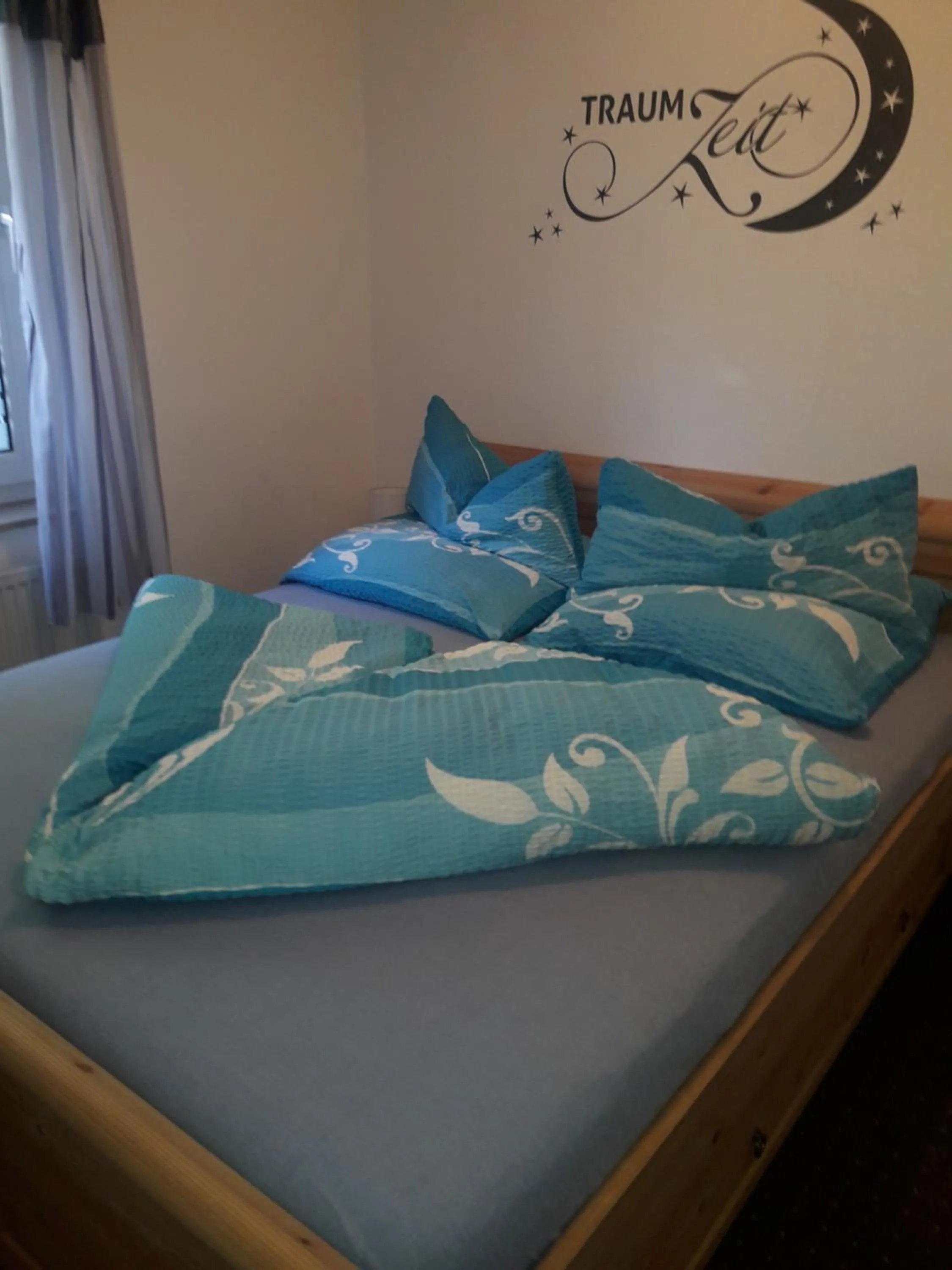 Bed in Ferienwohnung Inge Steinrücken