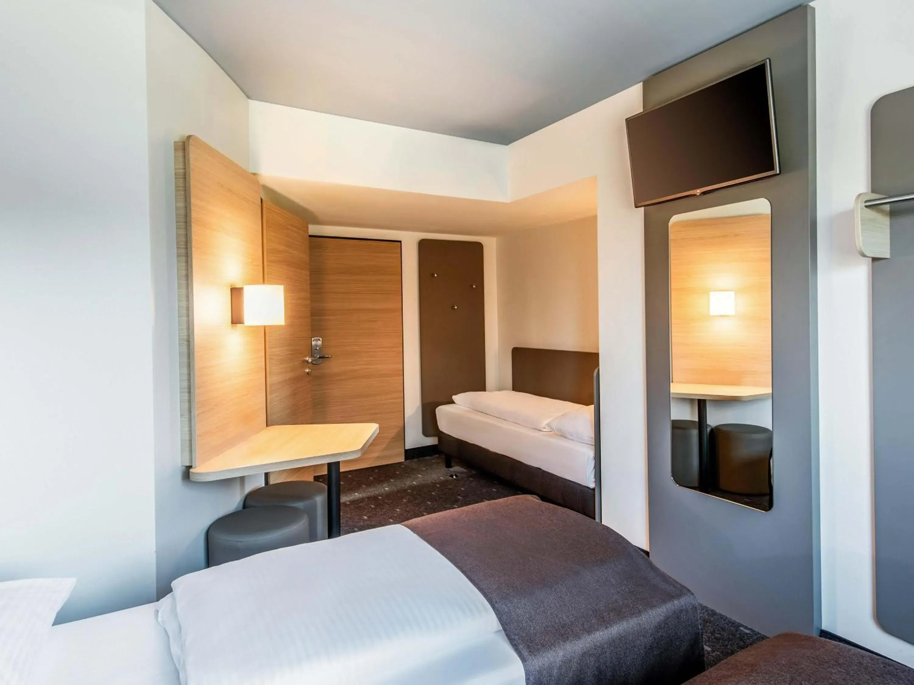 Photo of the whole room, Bed in B&B Hotel München City-West Photo of the whole room, Bed in B&B Hotel München City-West