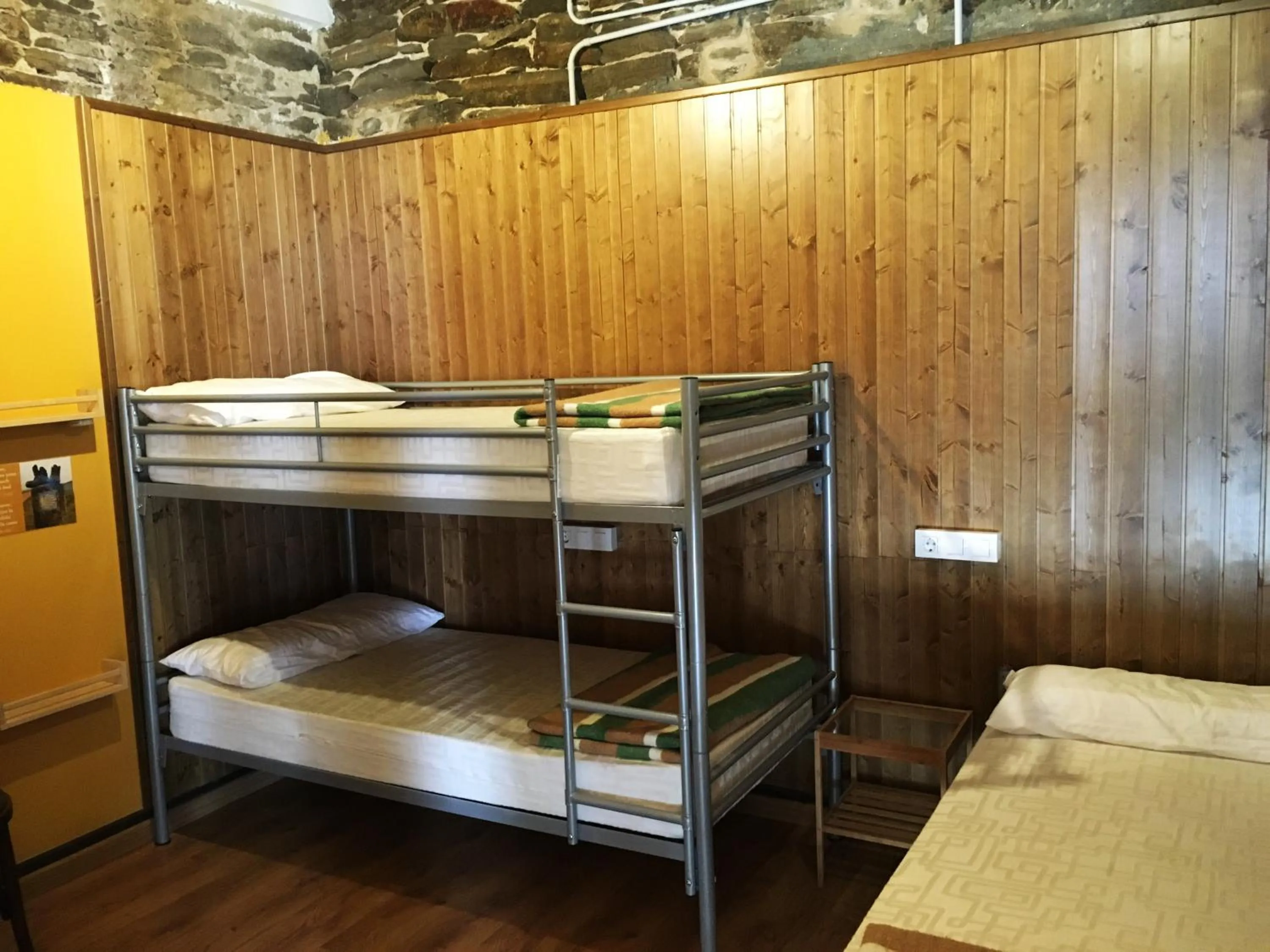Photo of the whole room, Bed in Albergue San Lázaro