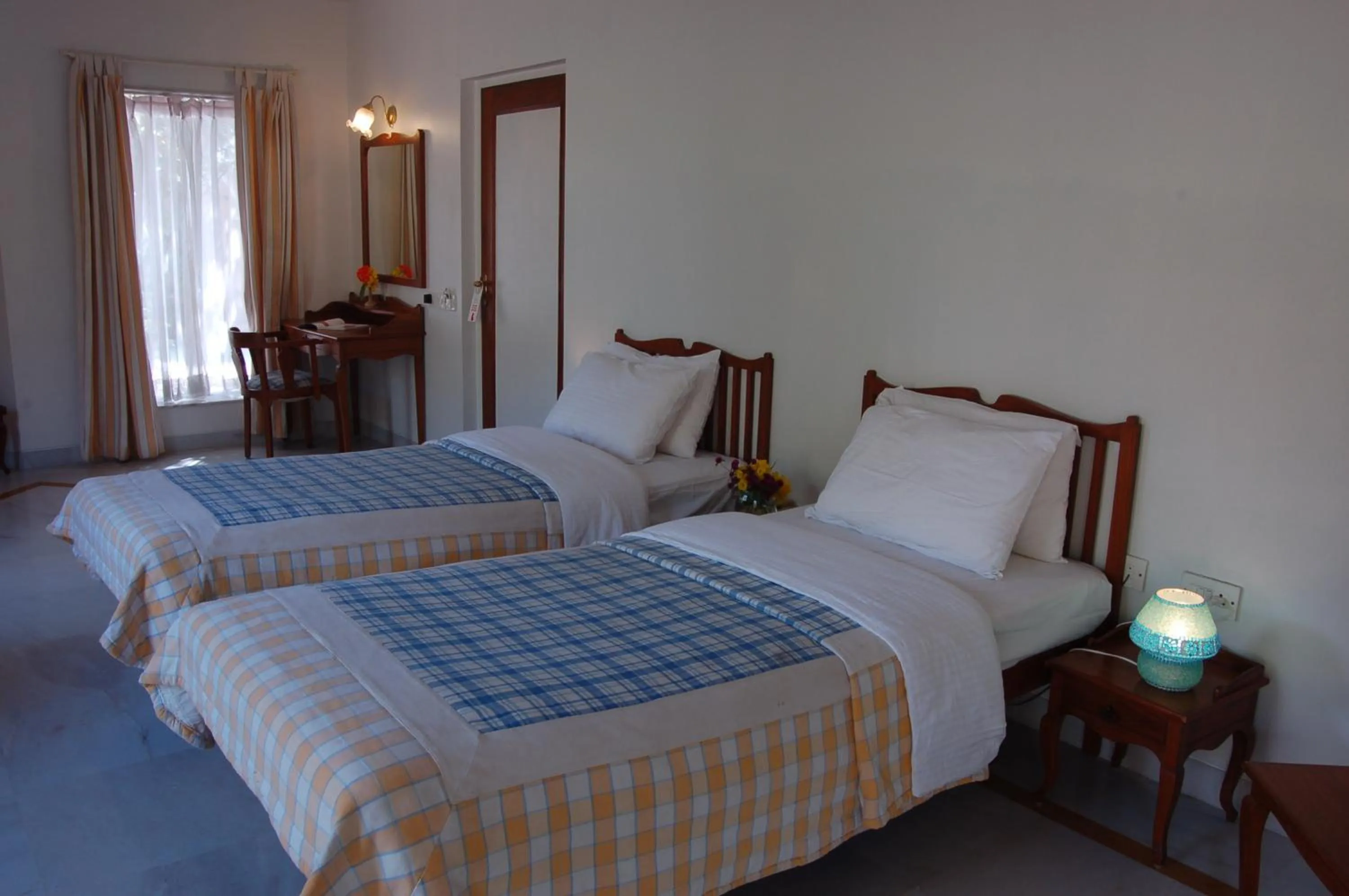 Bed in The Meadows Resort and Spa