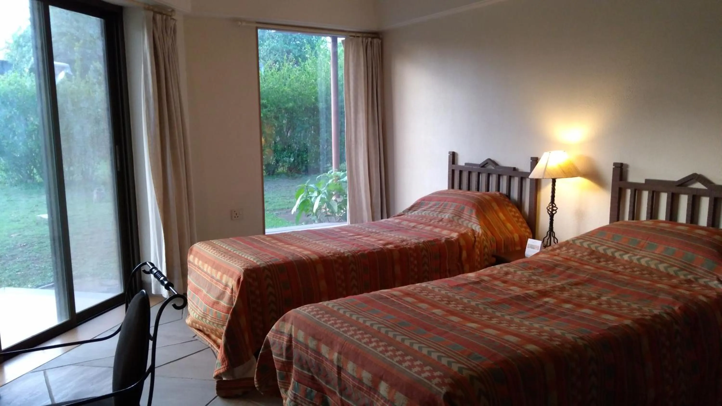 Bed in The Meadows Resort and Spa