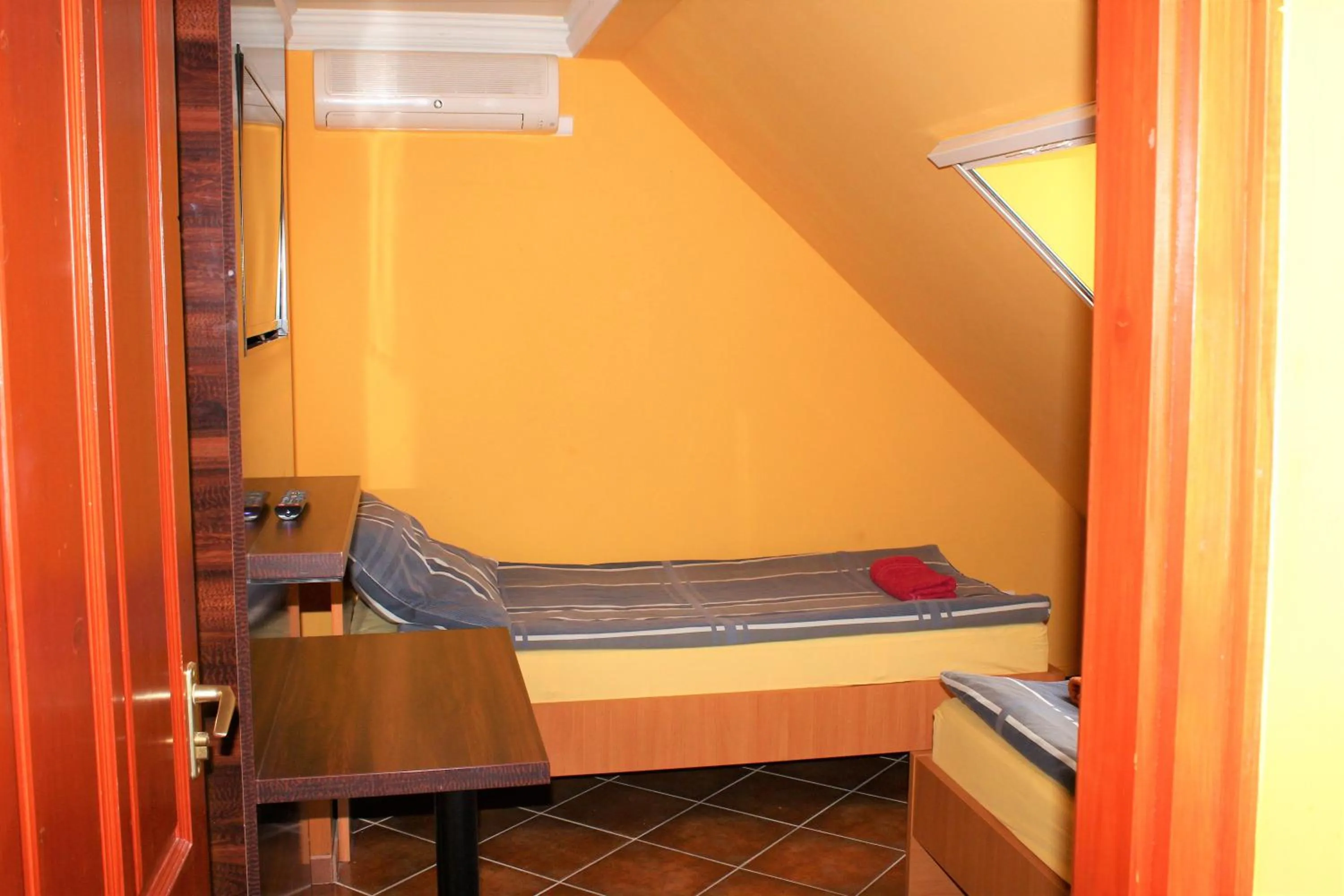 Bed in Nexus Vendégház Szeged