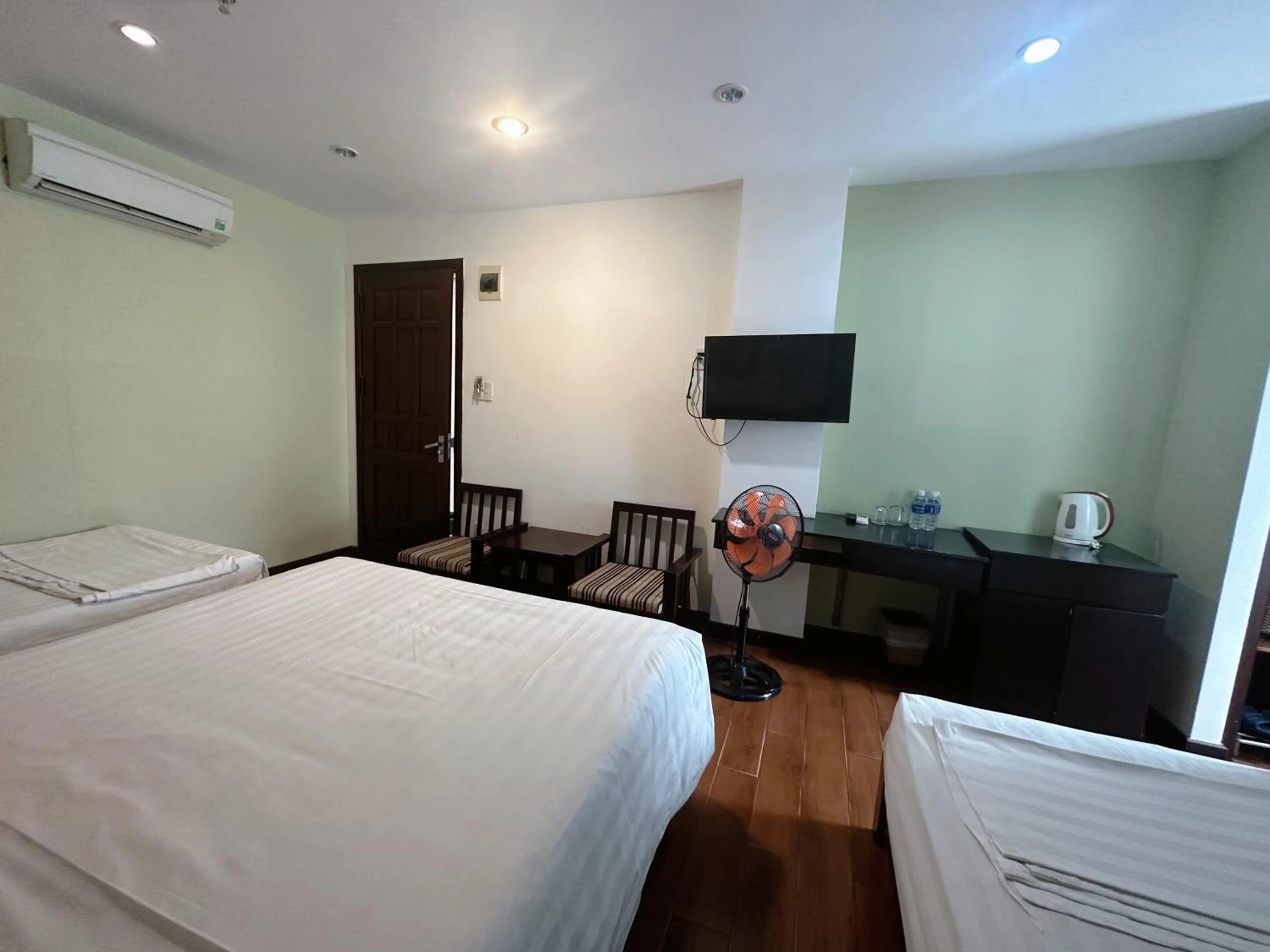 Bed in Dragon Sea Hotel