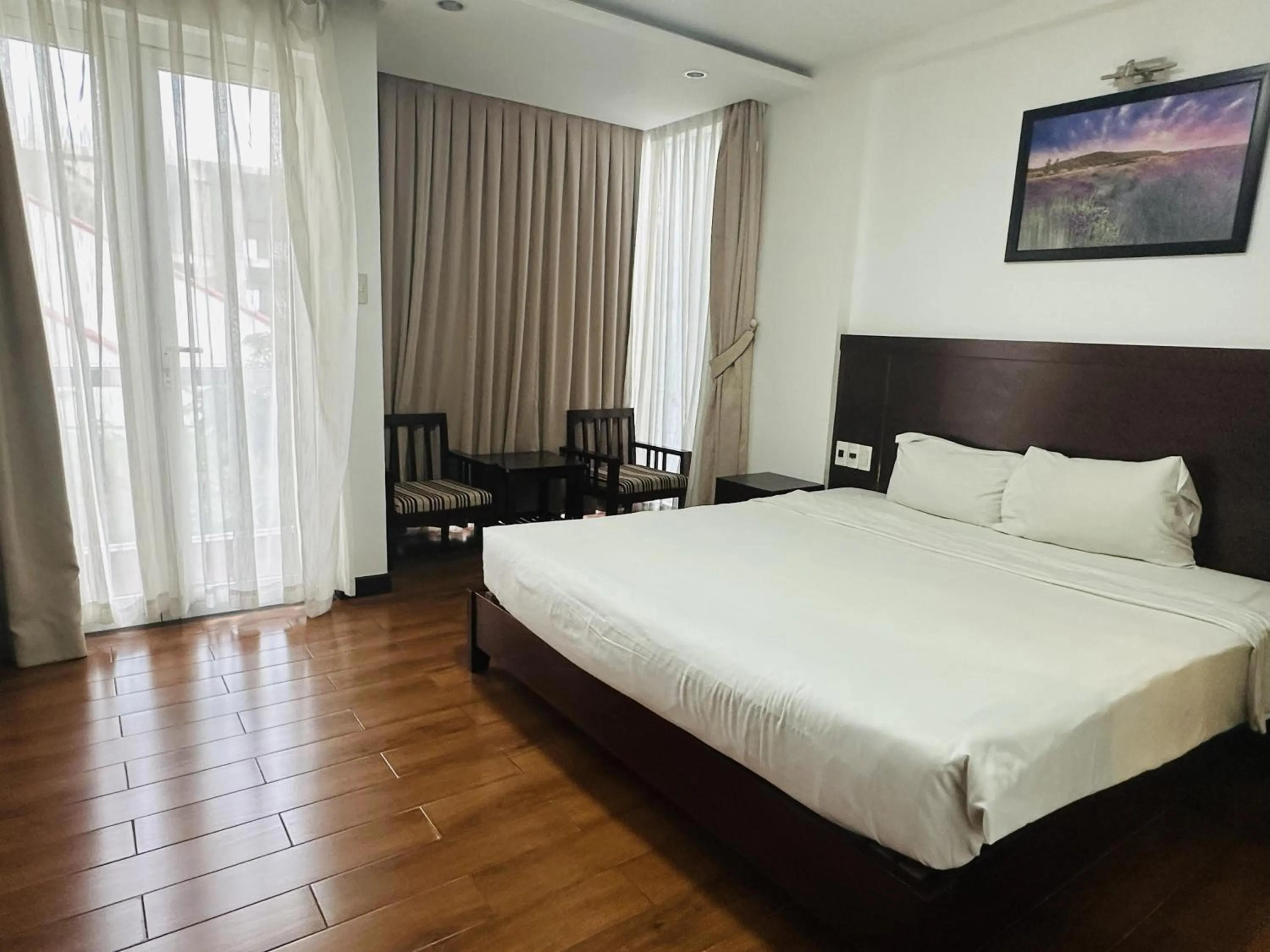 Bed in Dragon Sea Hotel