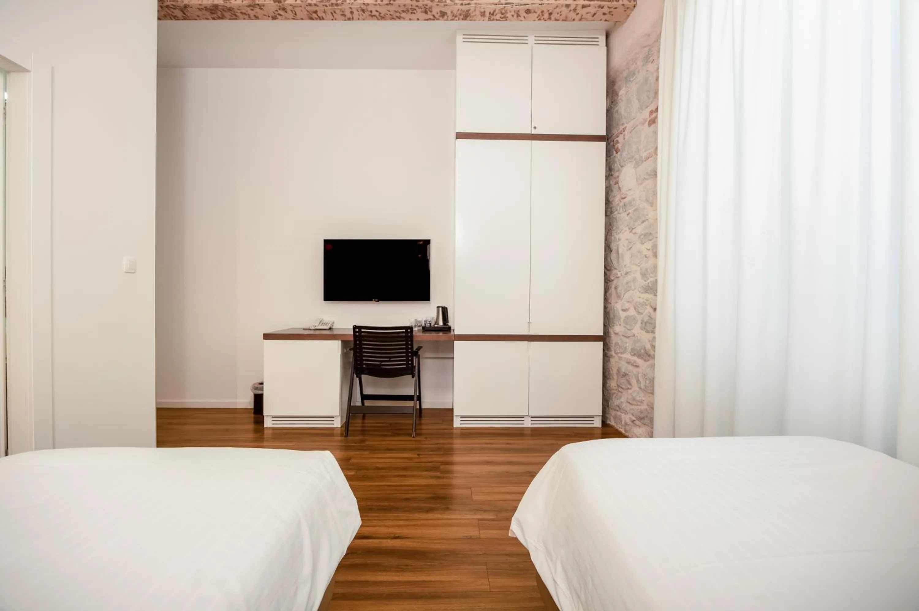 Bed in Azur Palace Luxury Rooms