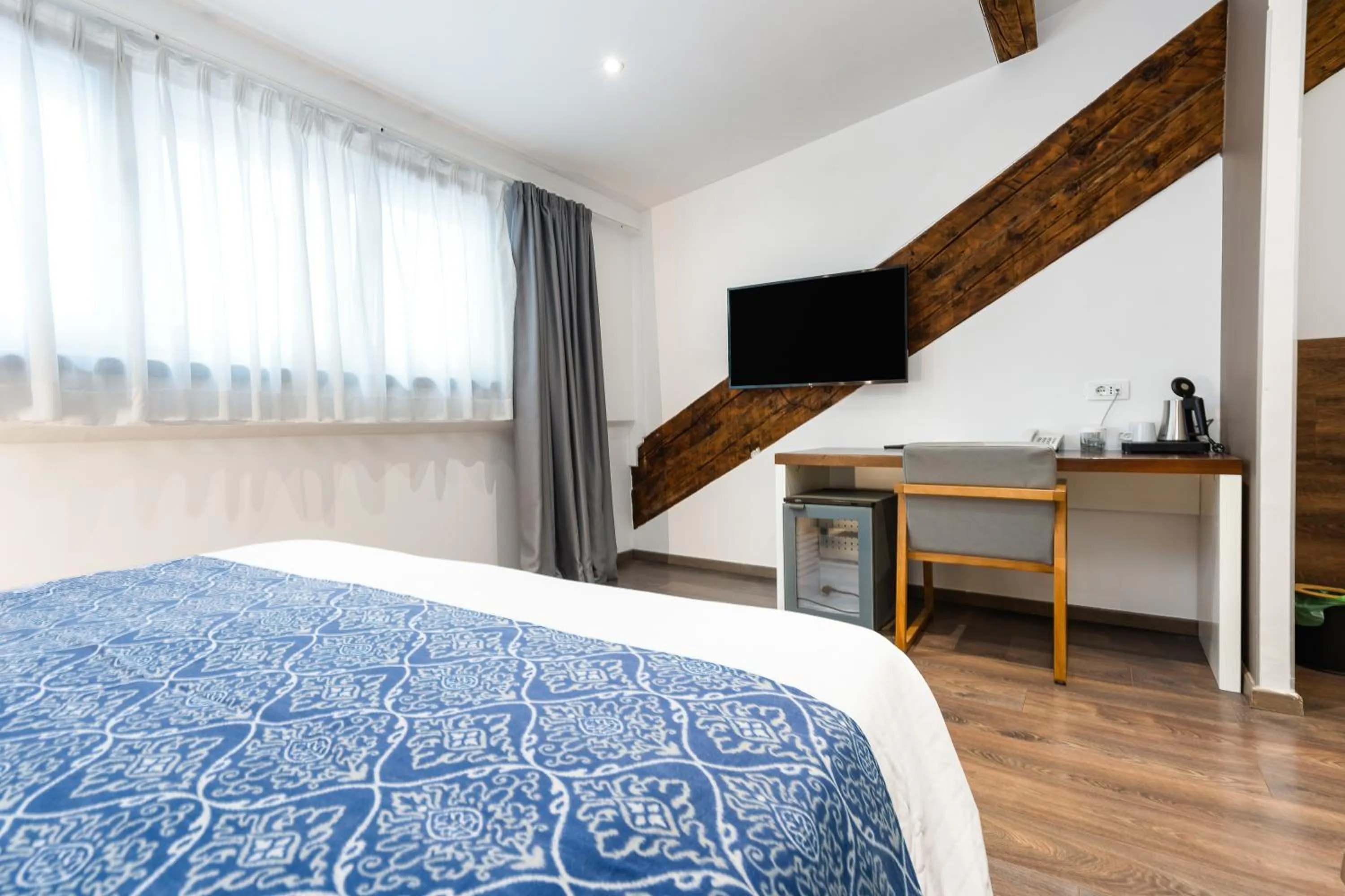 Bed in Azur Palace Luxury Rooms