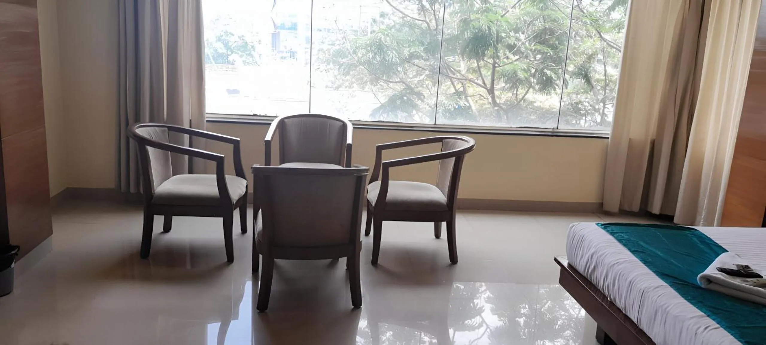 Seating area, Bed in Pphliving Fortune suites