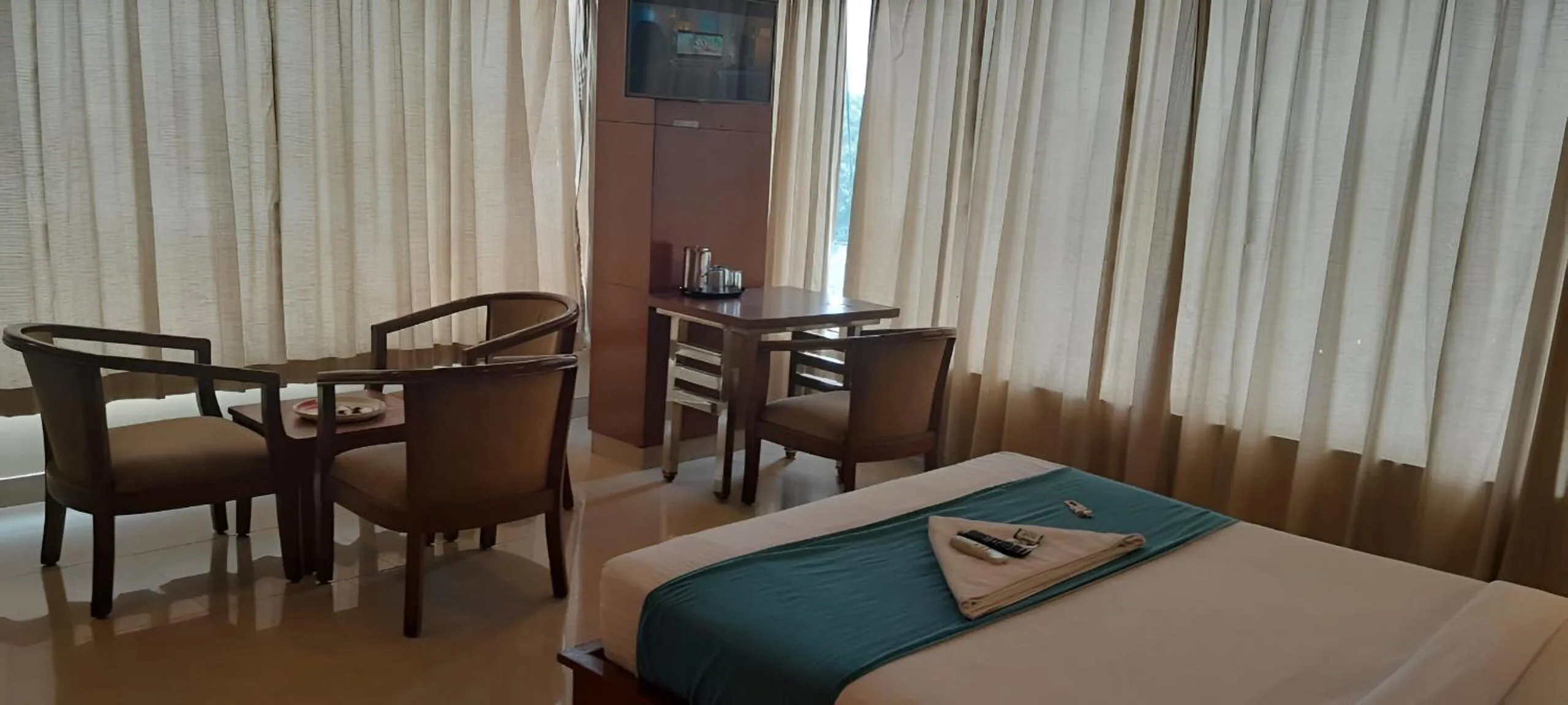 Seating area, Bed in Pphliving Fortune suites