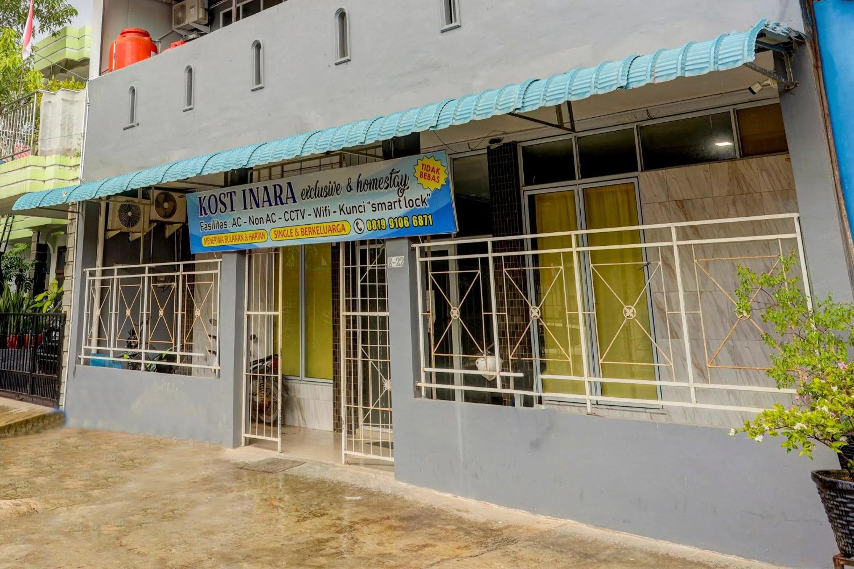 Facade/entrance in Hotel O Inara Homestay
