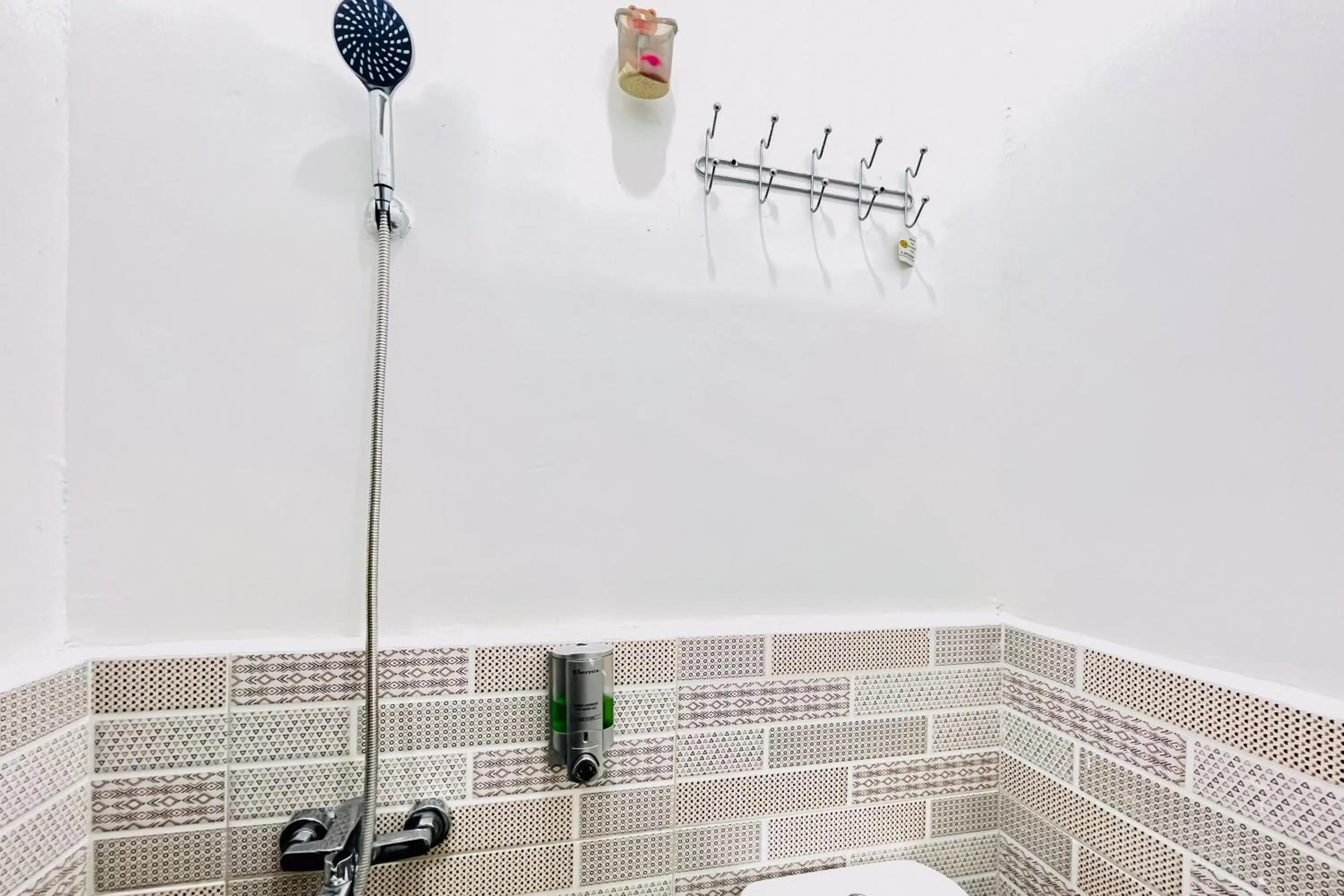 Bathroom in RedDoorz at Orien Guesthouse Pematang Siantar