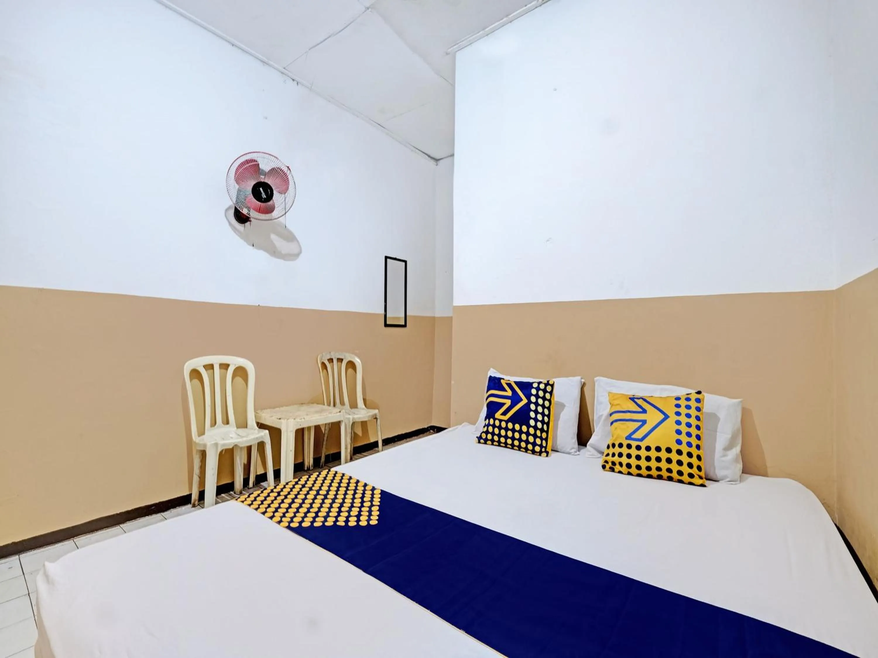 Bedroom in SPOT ON 92983 Hotel Ayu